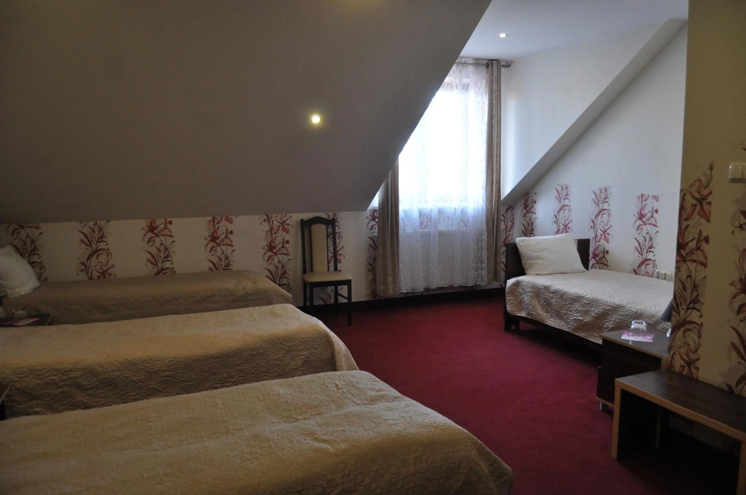 Bed in Hotel Prymus