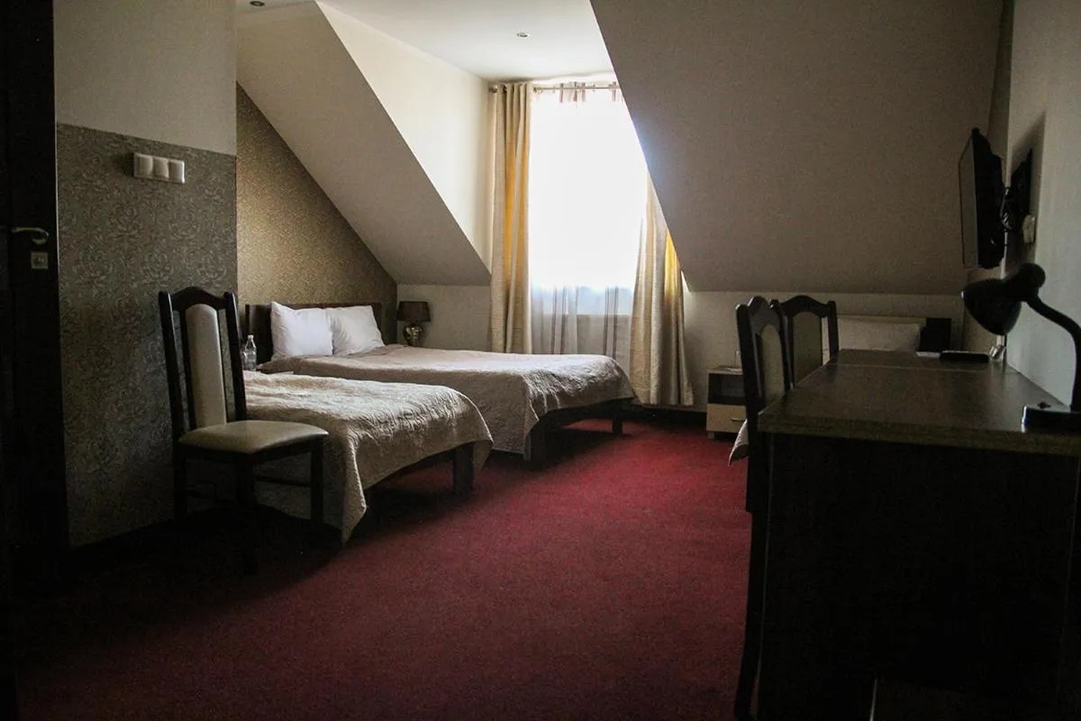 Bed in Hotel Prymus