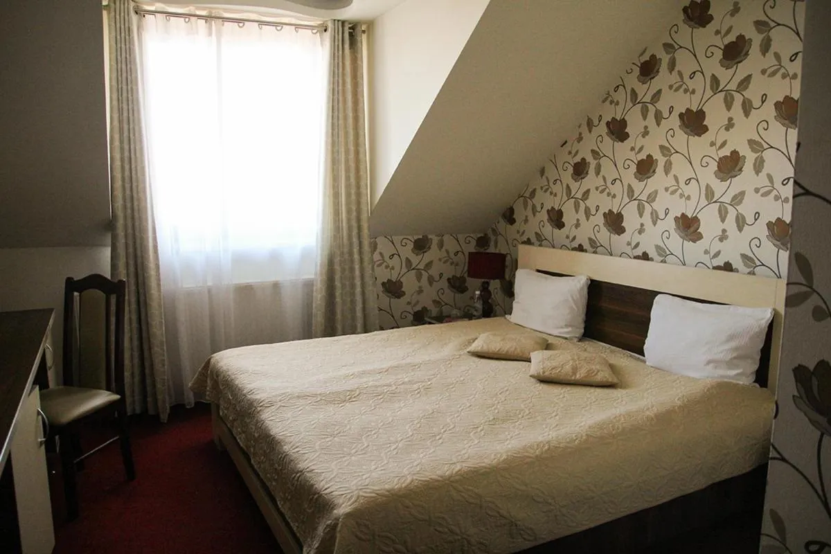 Photo of the whole room, Bed in Hotel Prymus