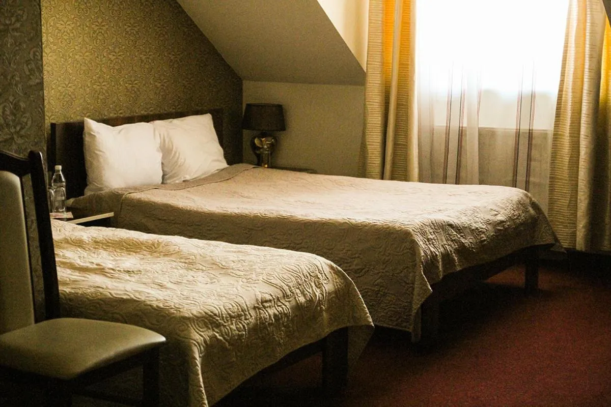 Bed in Hotel Prymus