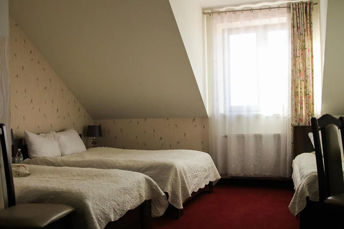 Bed in Hotel Prymus