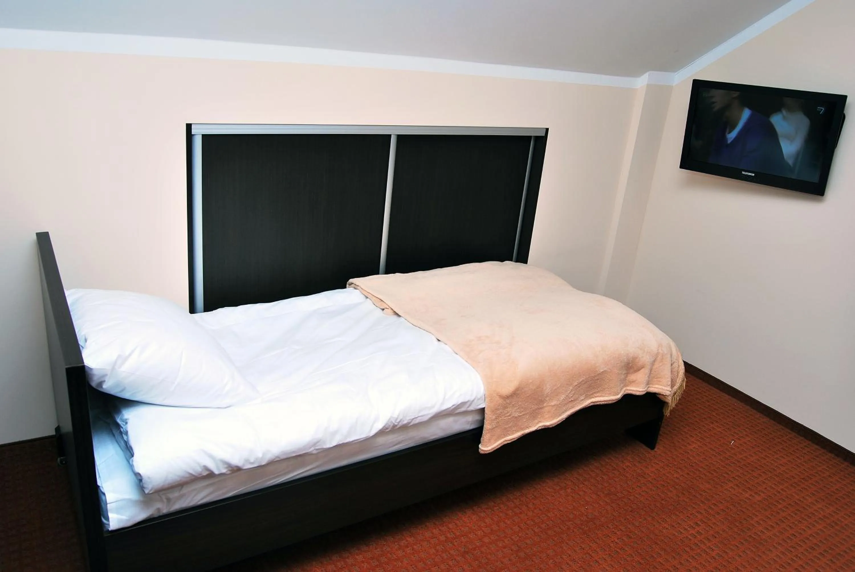 Bed in Hotel Prymus