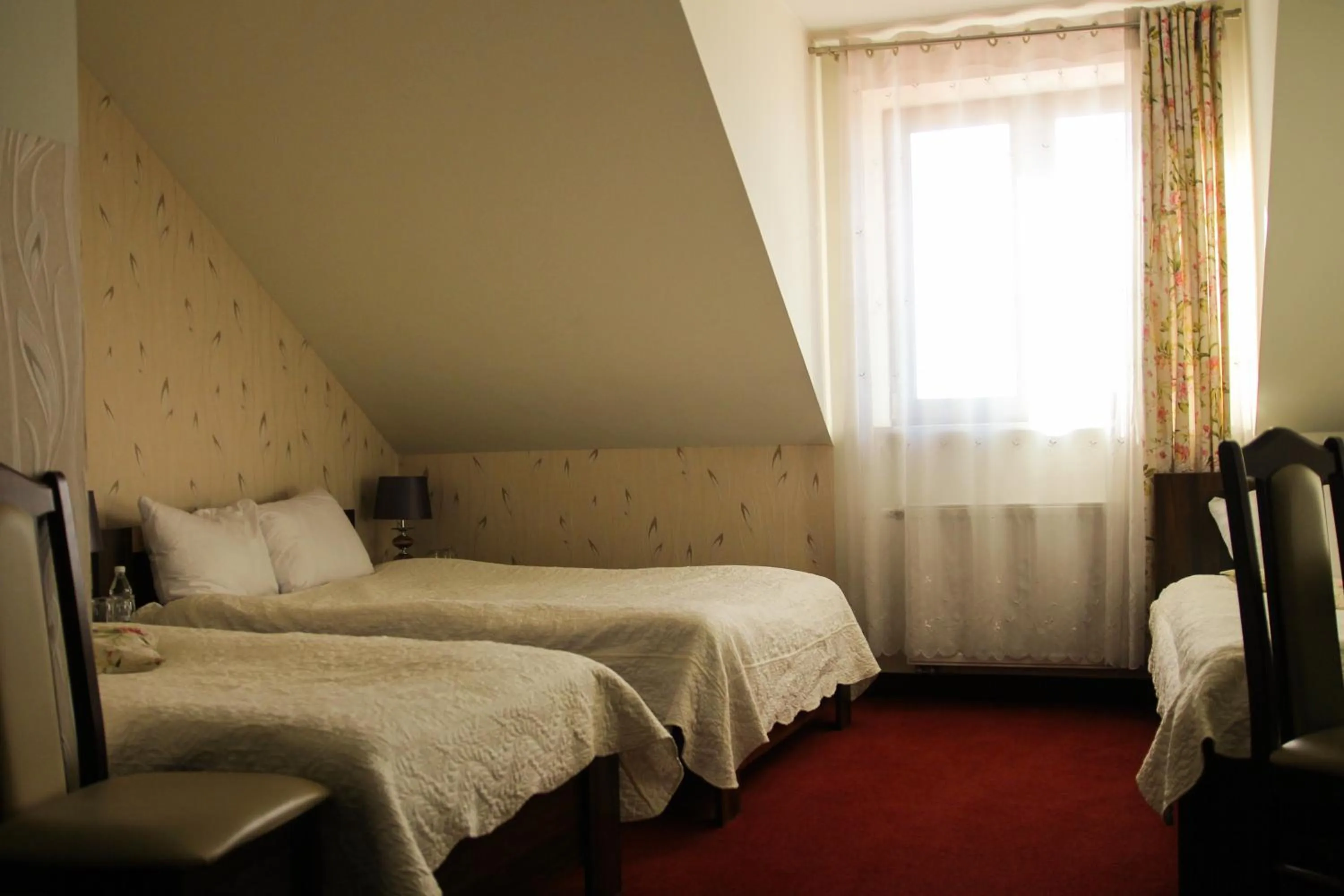 Bed in Hotel Prymus