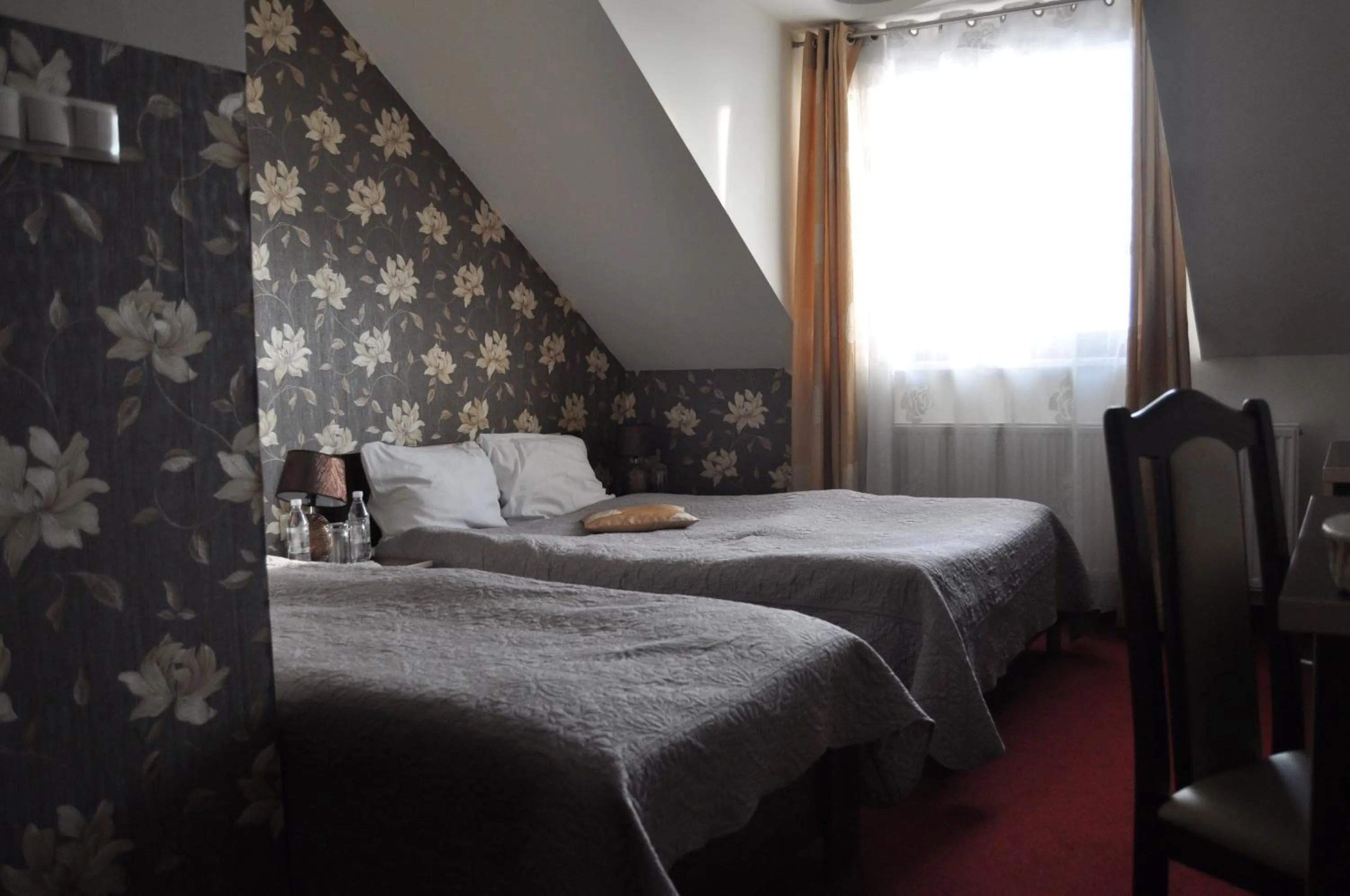 Bed in Hotel Prymus