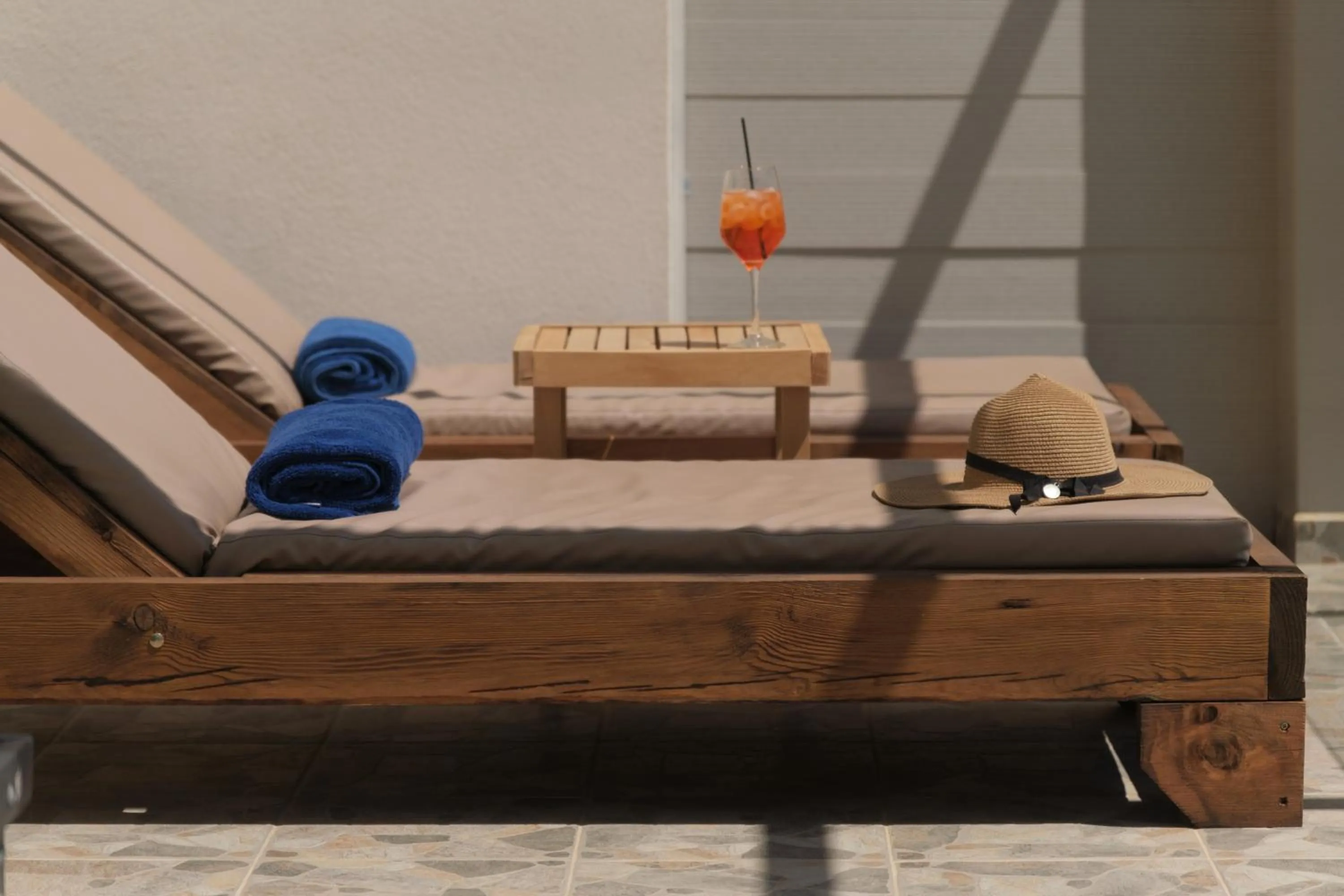 sunbed in Zeus Throne Suites