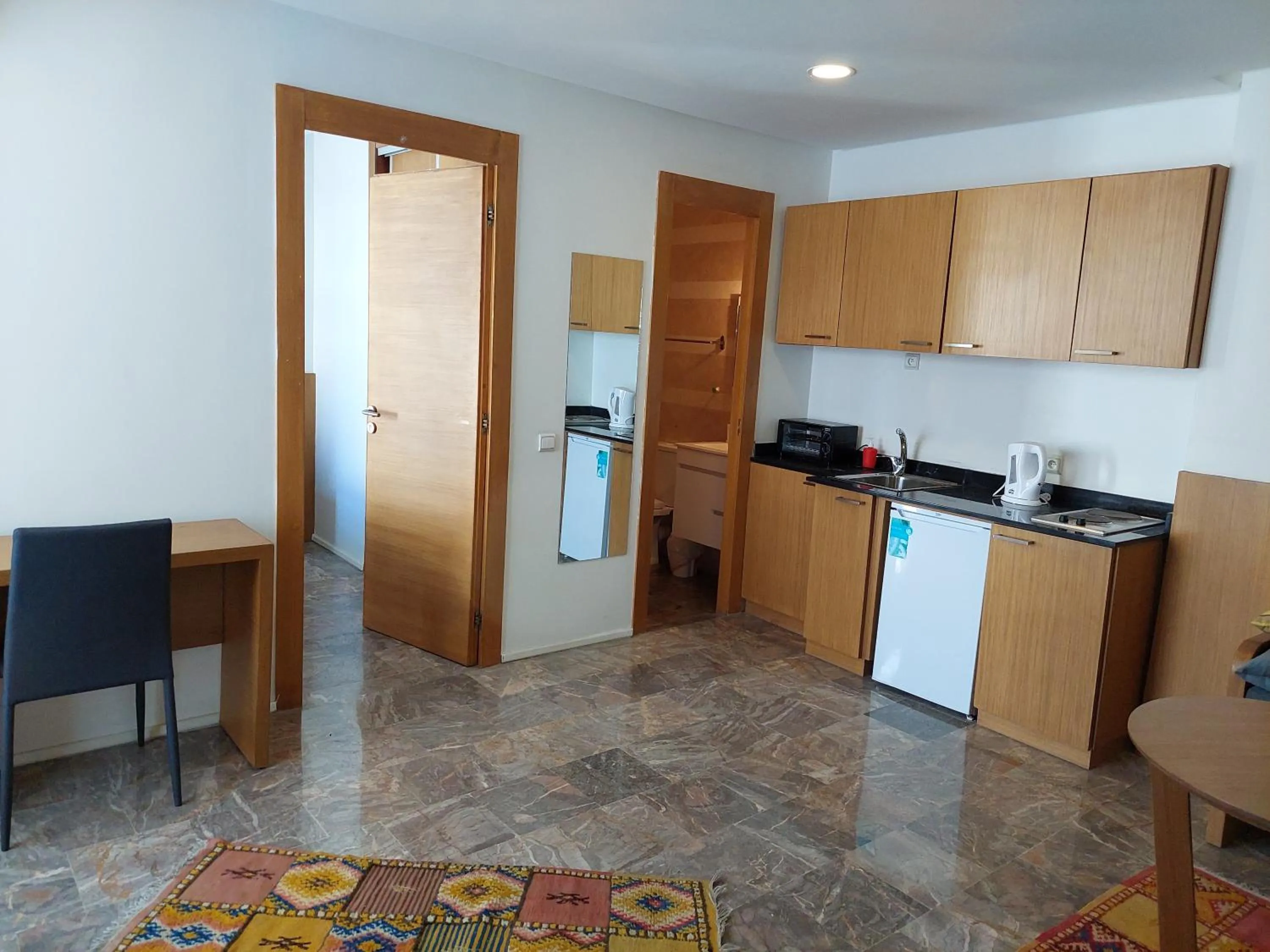 Kitchen or kitchenette in Casa City Break Appart hôtel