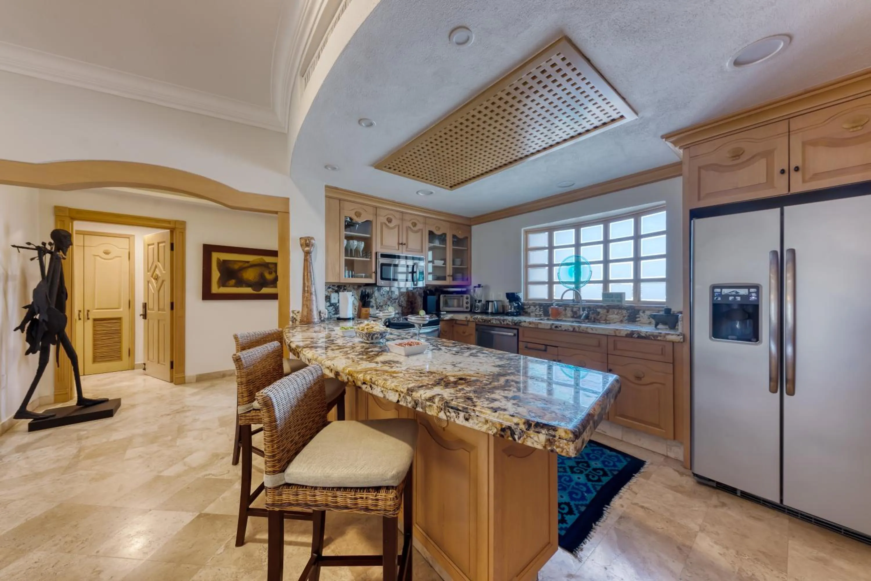 Kitchen or kitchenette in Villa La Estancia - Medano Beach Villas