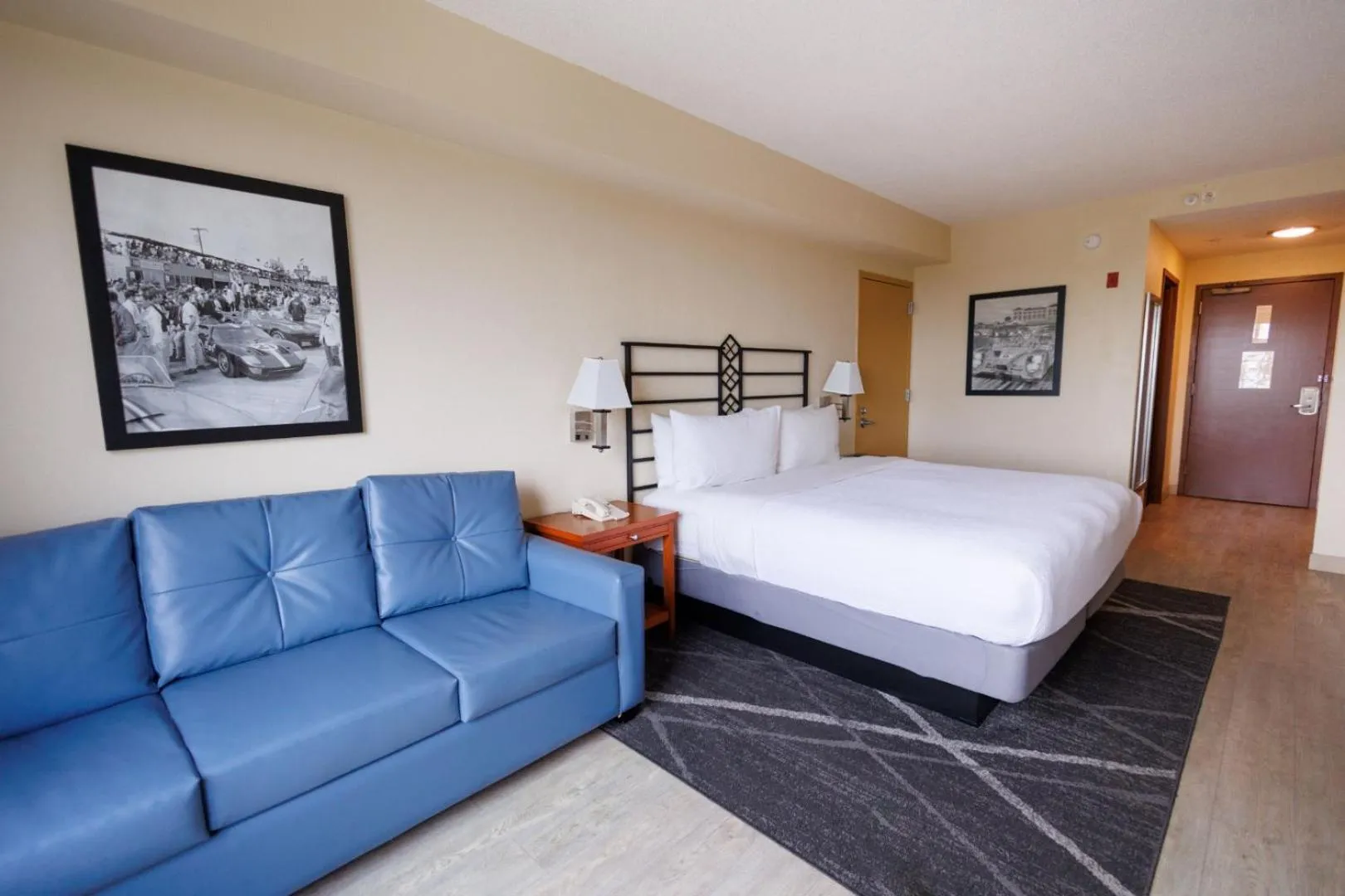 Photo of the whole room, Bed in SEVEN Sebring Raceway Hotel