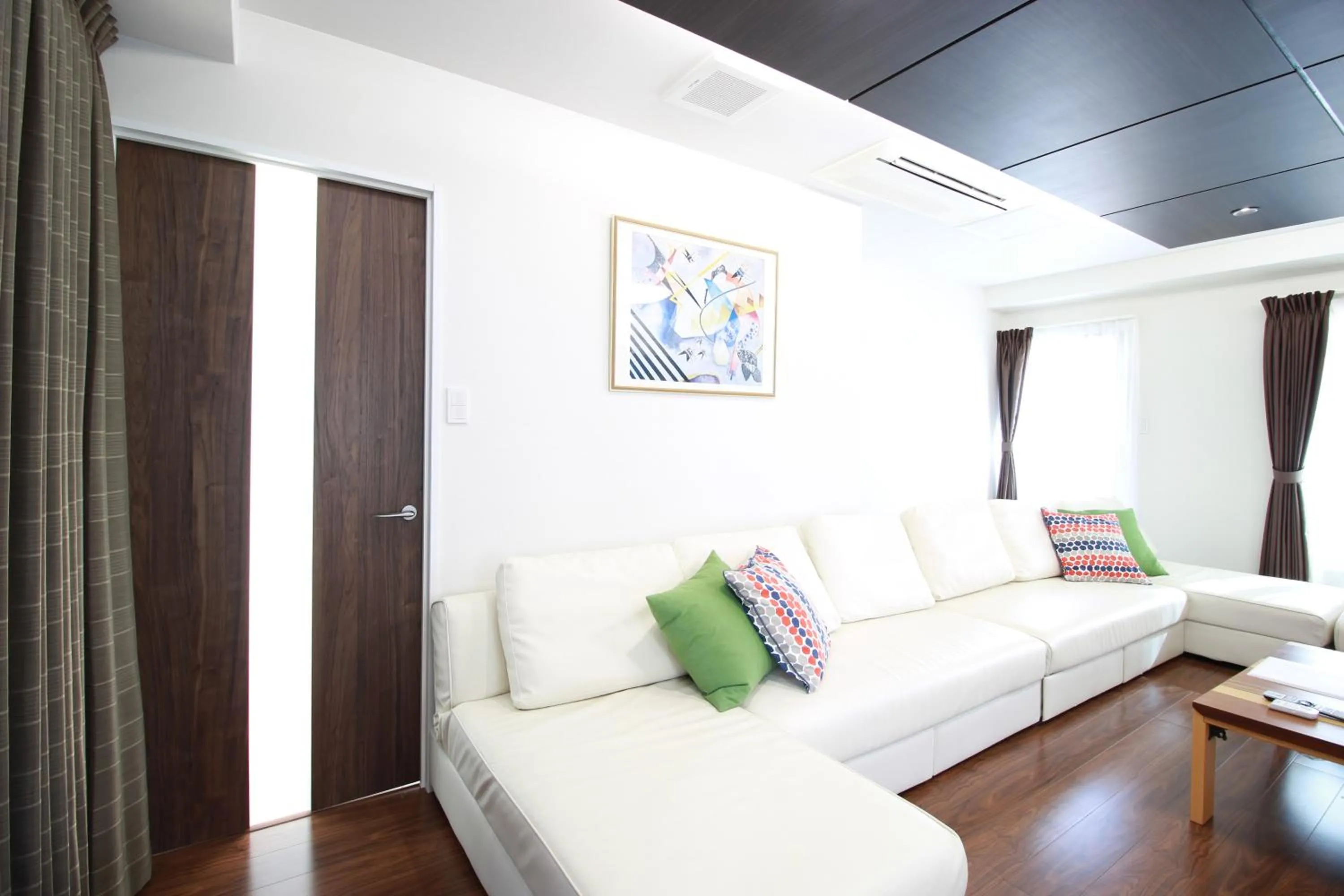 Living room, Bed in Atrium Deluxe Apartments Osaka - Self Check-In Only