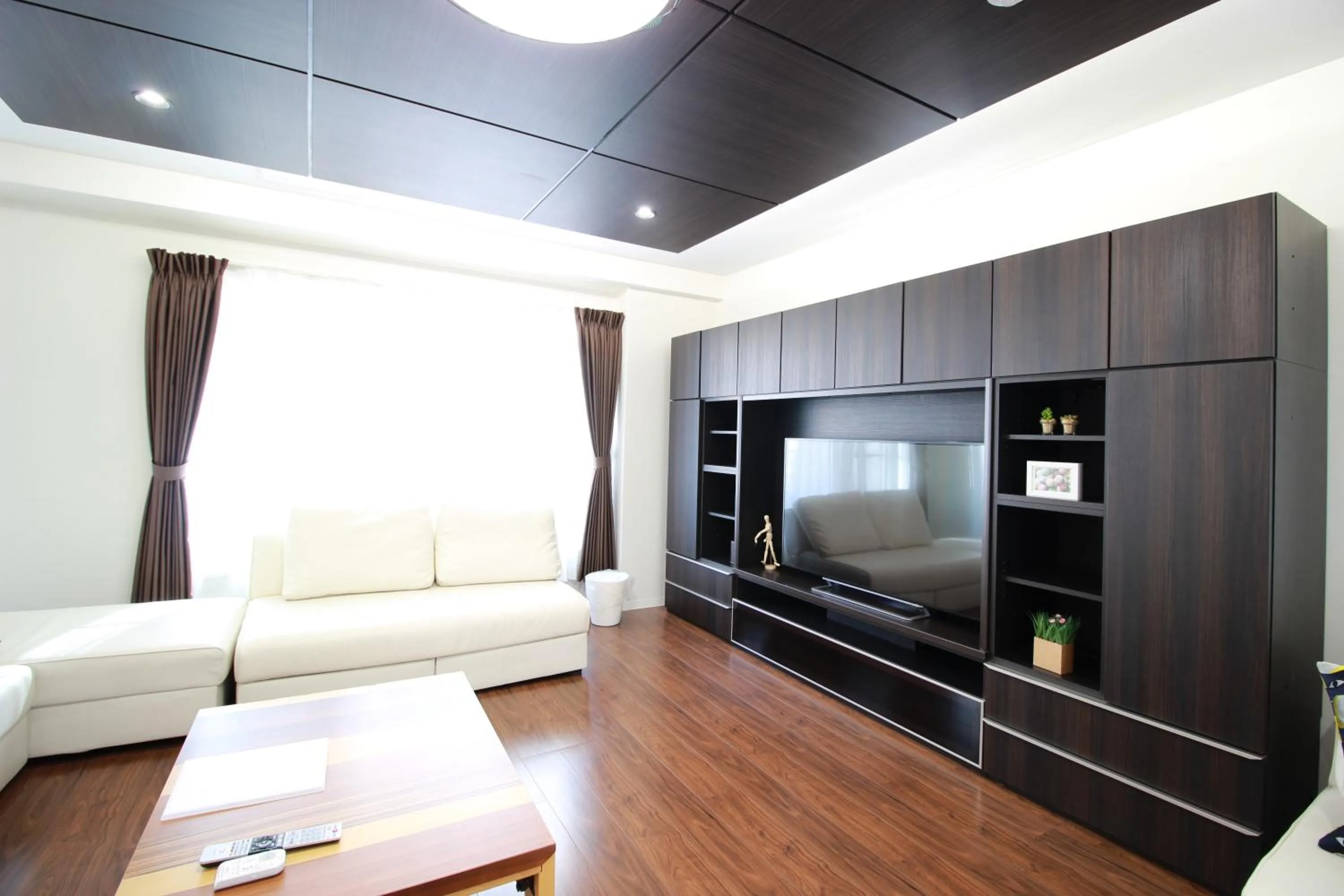 Living room in Atrium Deluxe Apartments Osaka - Self Check-In Only