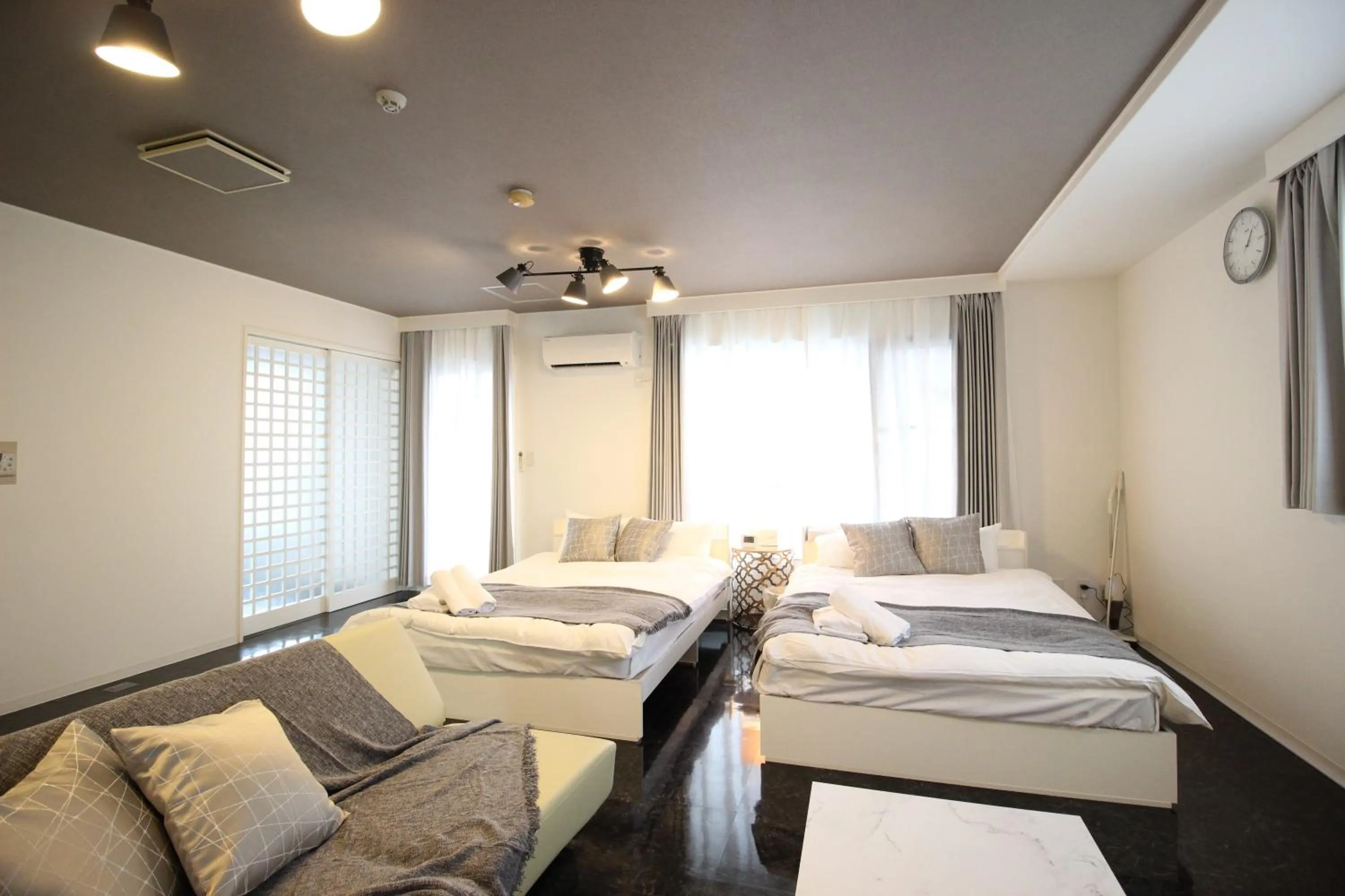 Photo of the whole room, Bed in Atrium Deluxe Apartments Osaka - Self Check-In Only