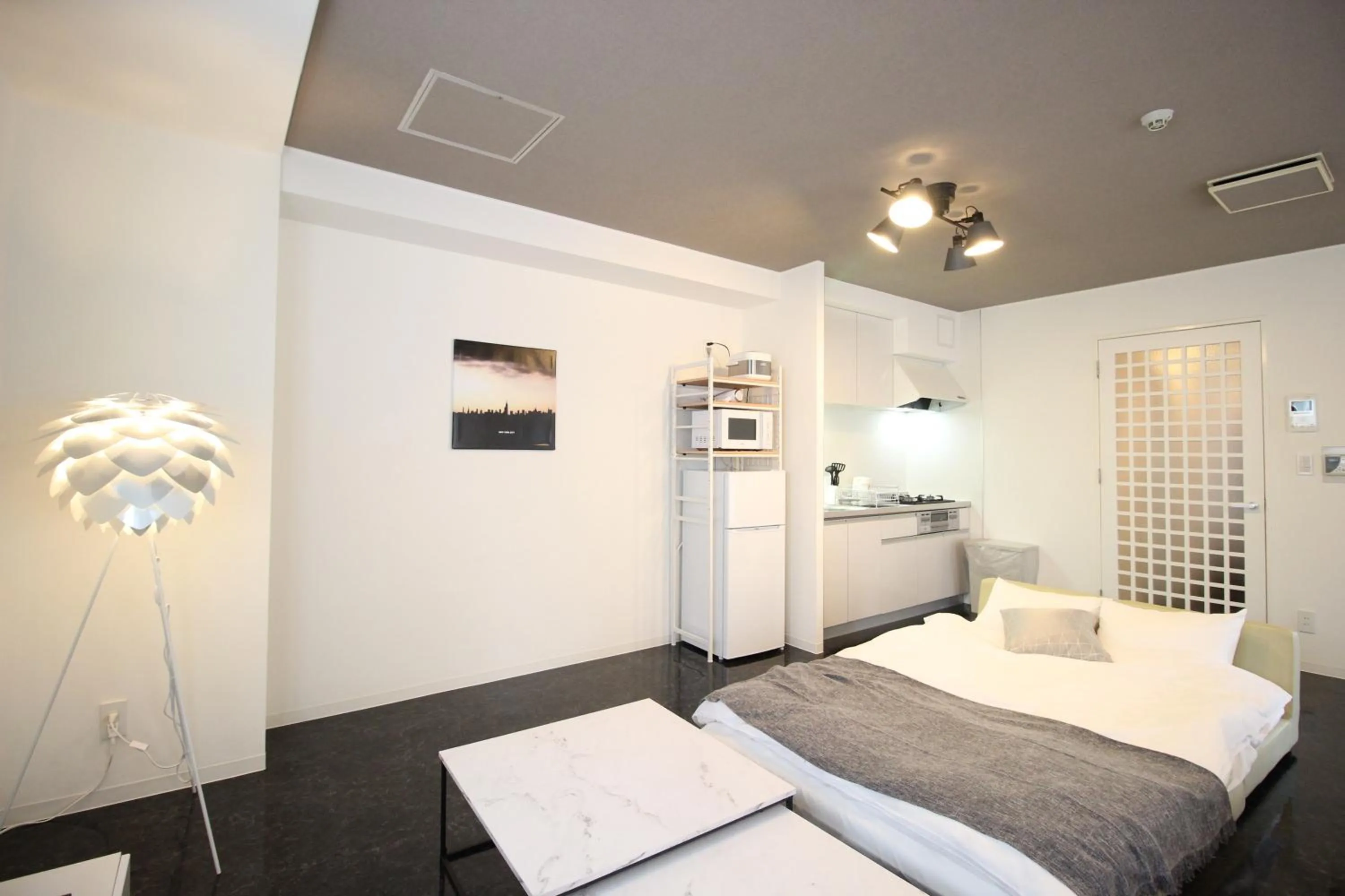 Living room, Bed in Atrium Deluxe Apartments Osaka - Self Check-In Only