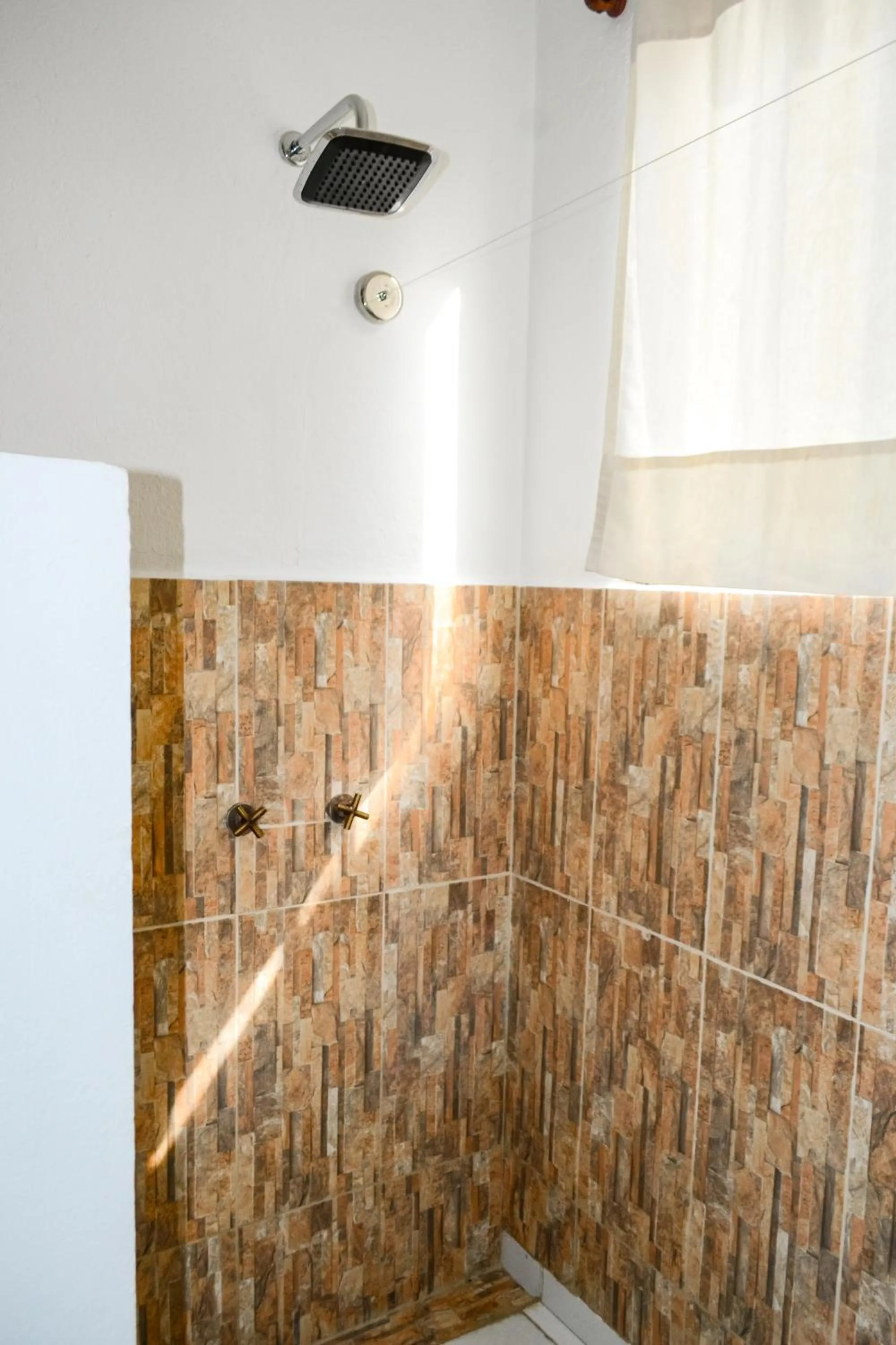 Shower in Aite Eco Resort