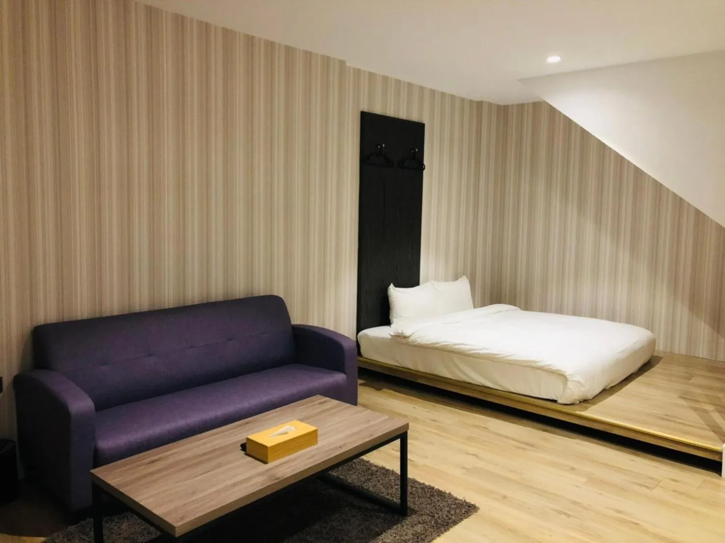 Living room, Bed in Oursea Hotel