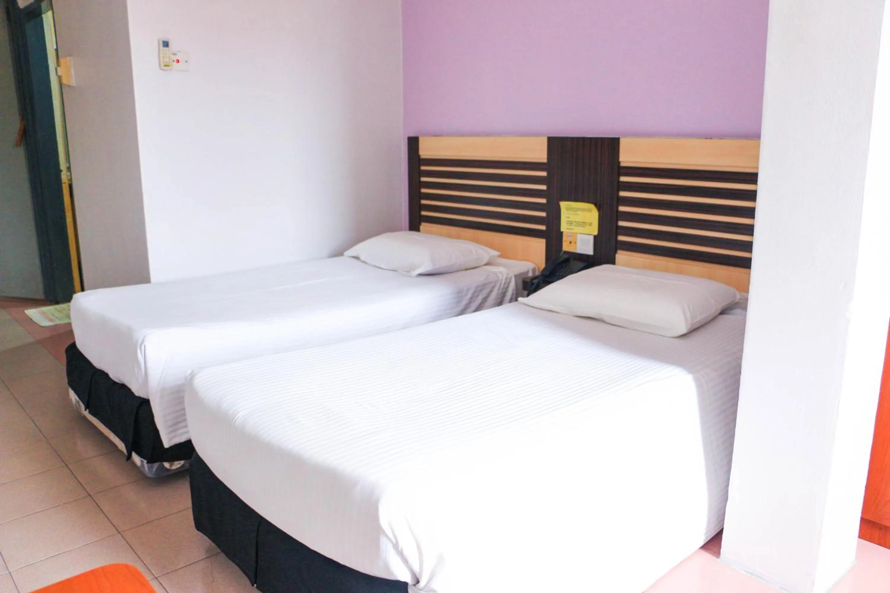 Bed in Hotel Lam Seng