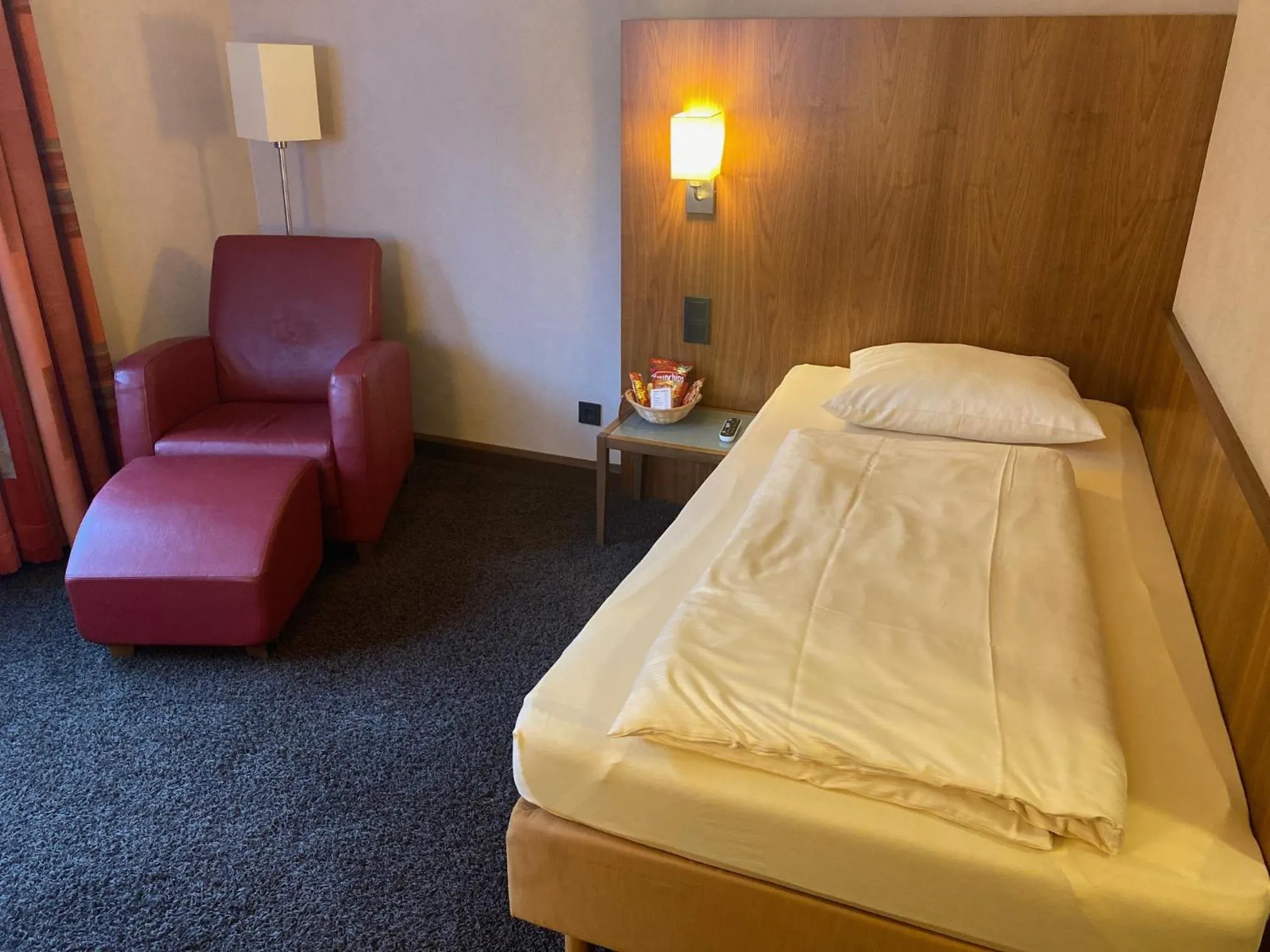 Photo of the whole room, Bed in Seehotel