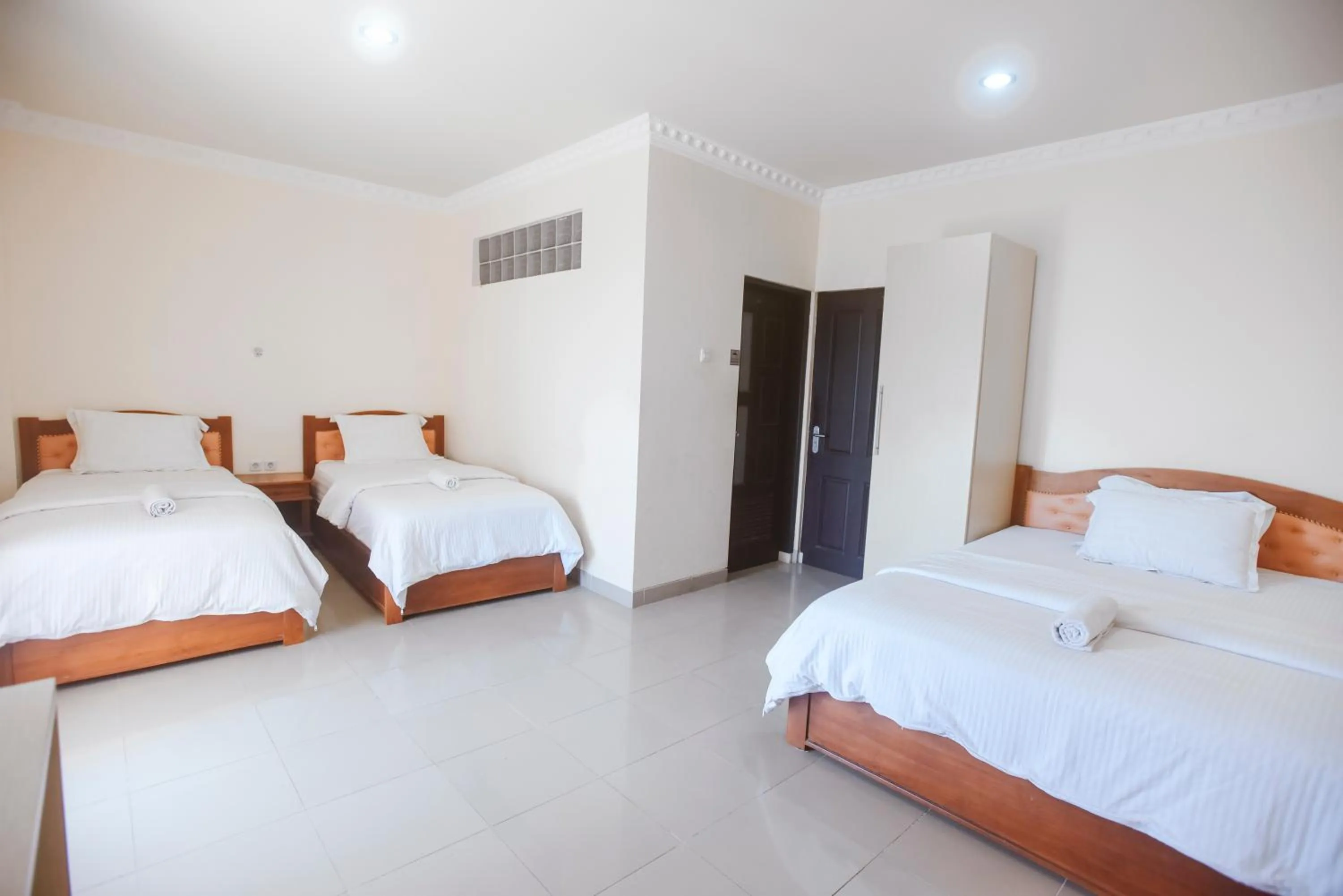 Bed in CHRYSANT HOTEL & RESORT