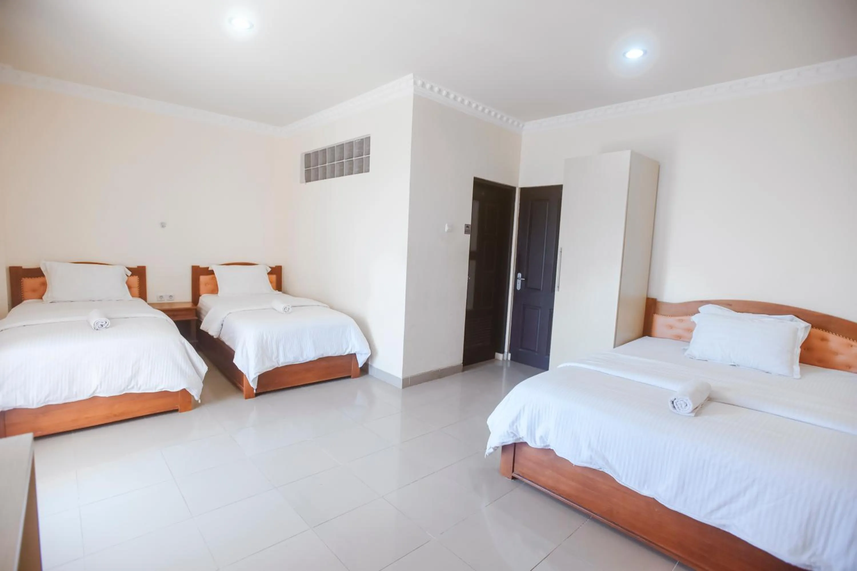 Bed in CHRYSANT HOTEL & RESORT