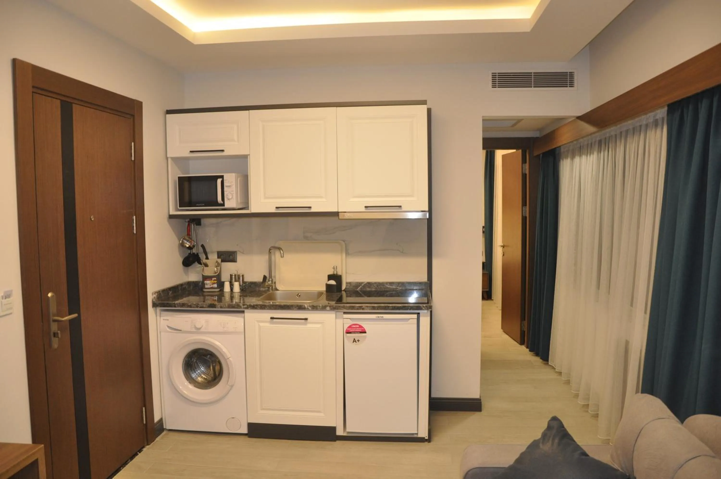 Kitchen or kitchenette in GOLAZ SUİT OTEL