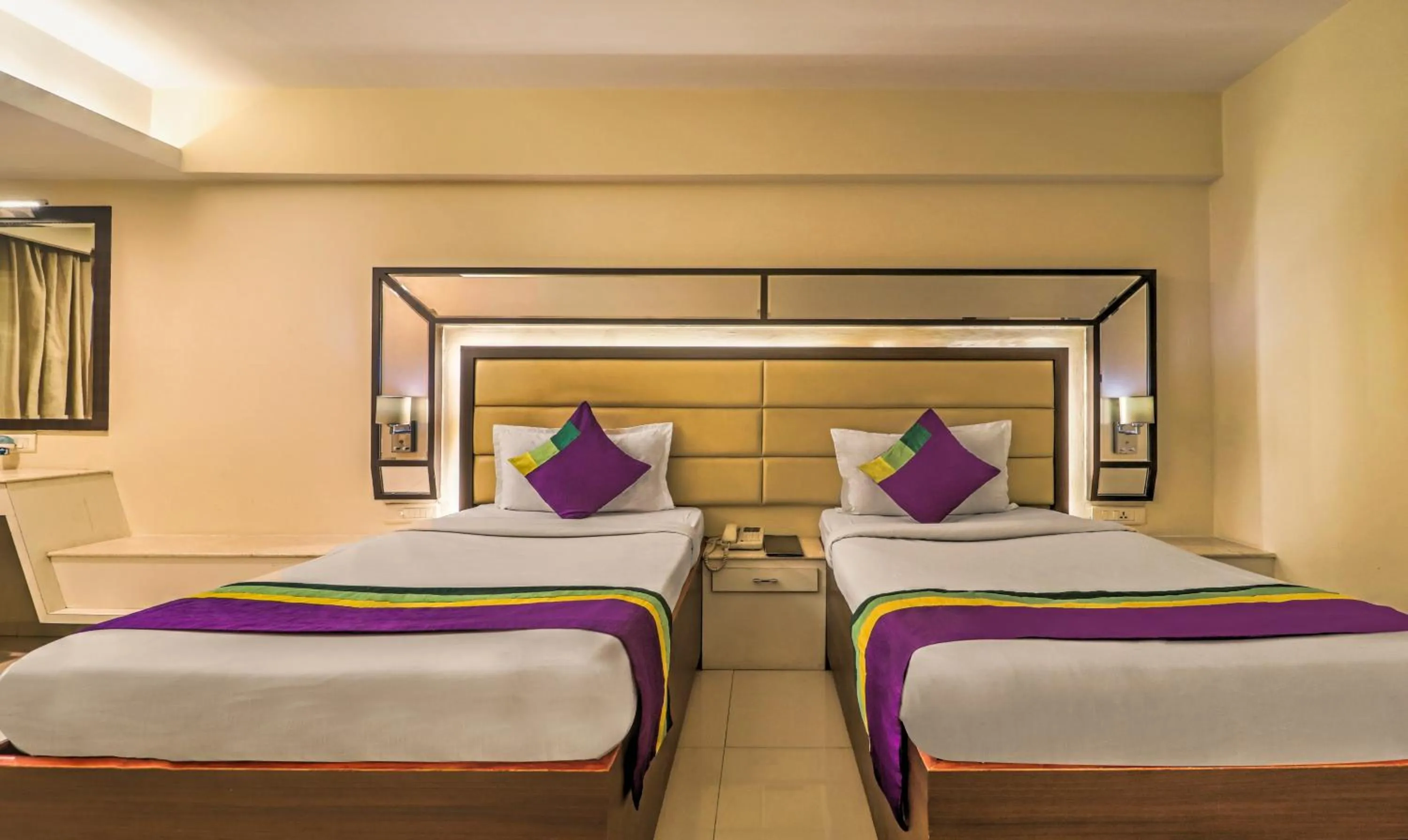 Bedroom, Bed in Treebo Premium Metropolis