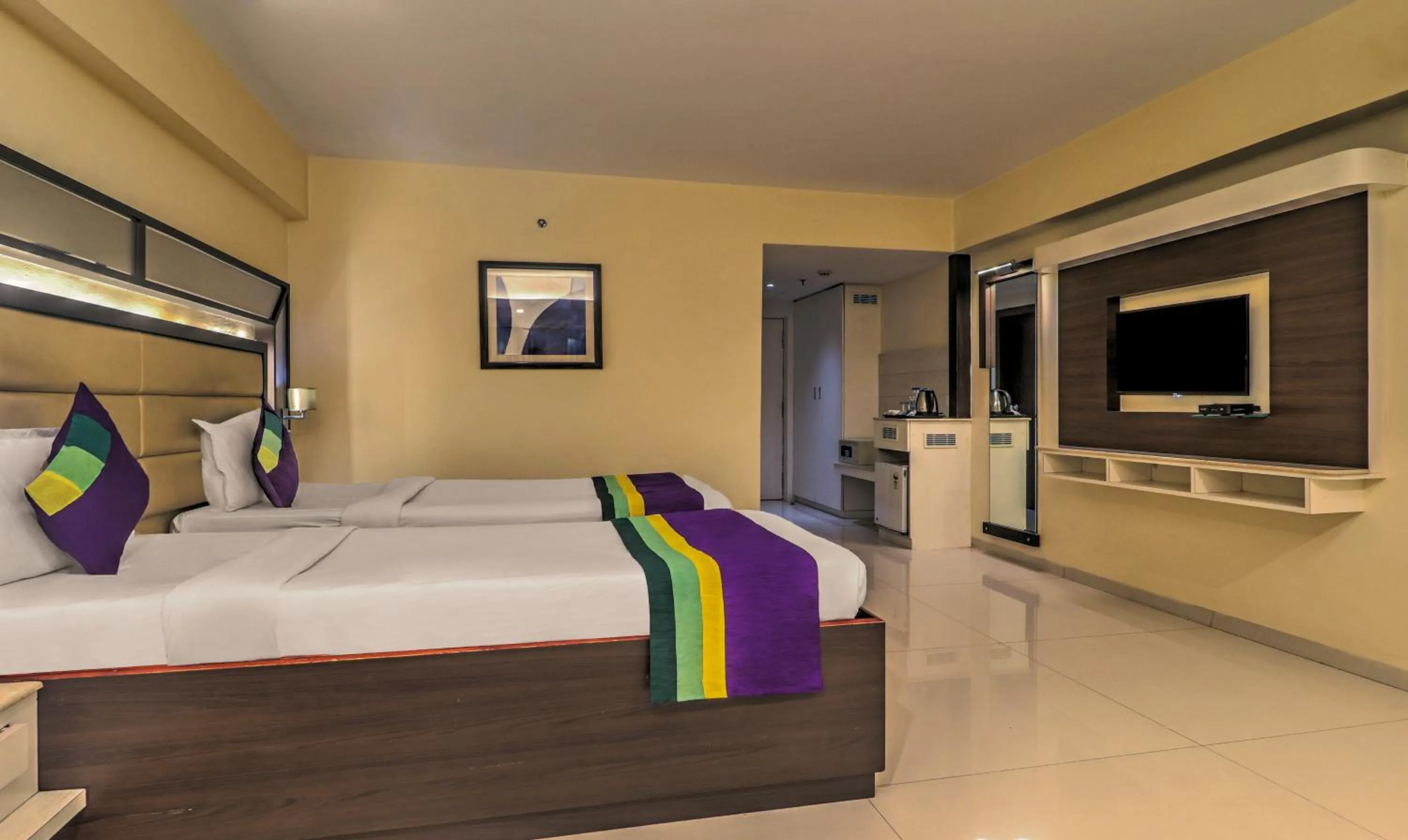 Bedroom, Bed in Treebo Premium Metropolis