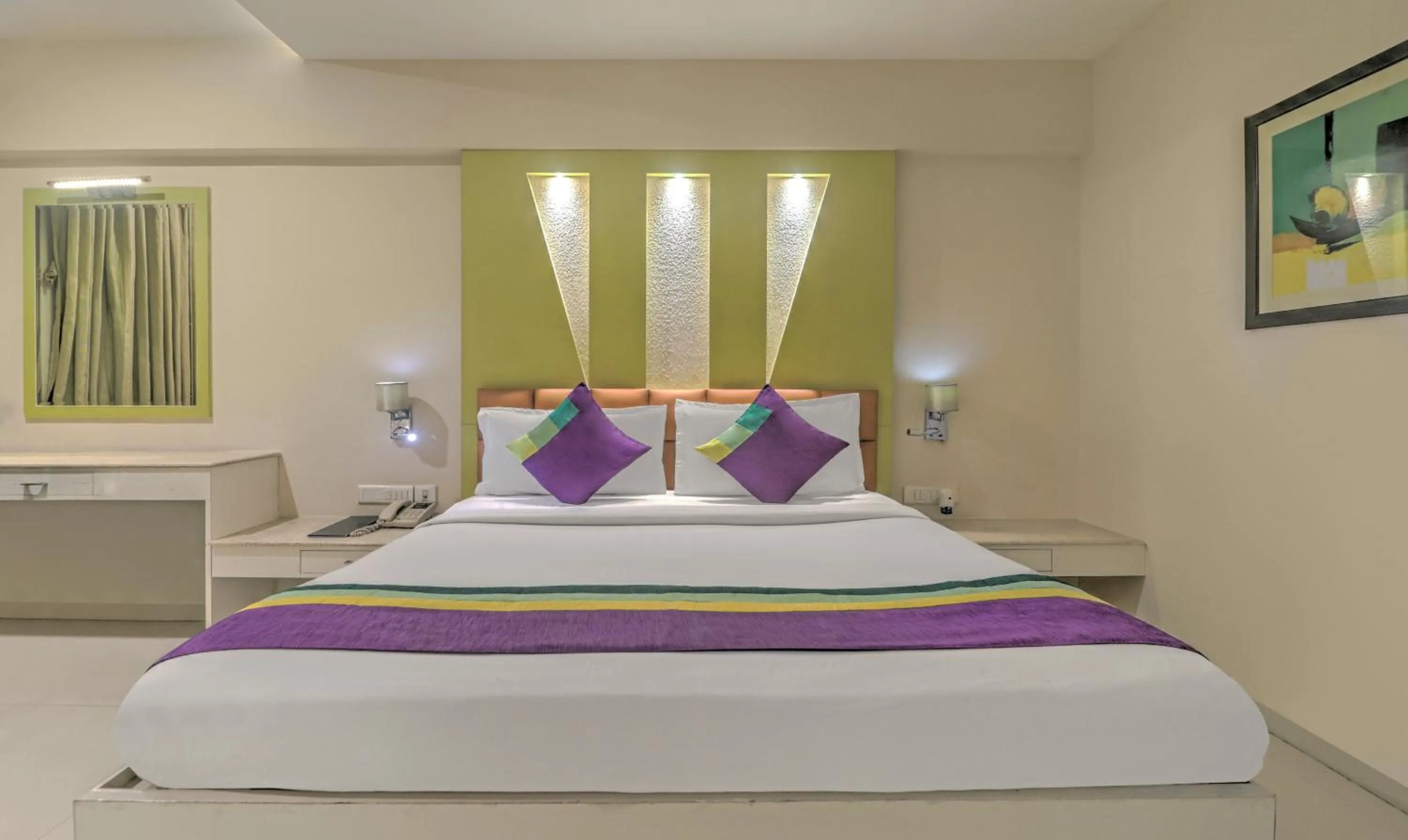 Bedroom, Bed in Treebo Premium Metropolis