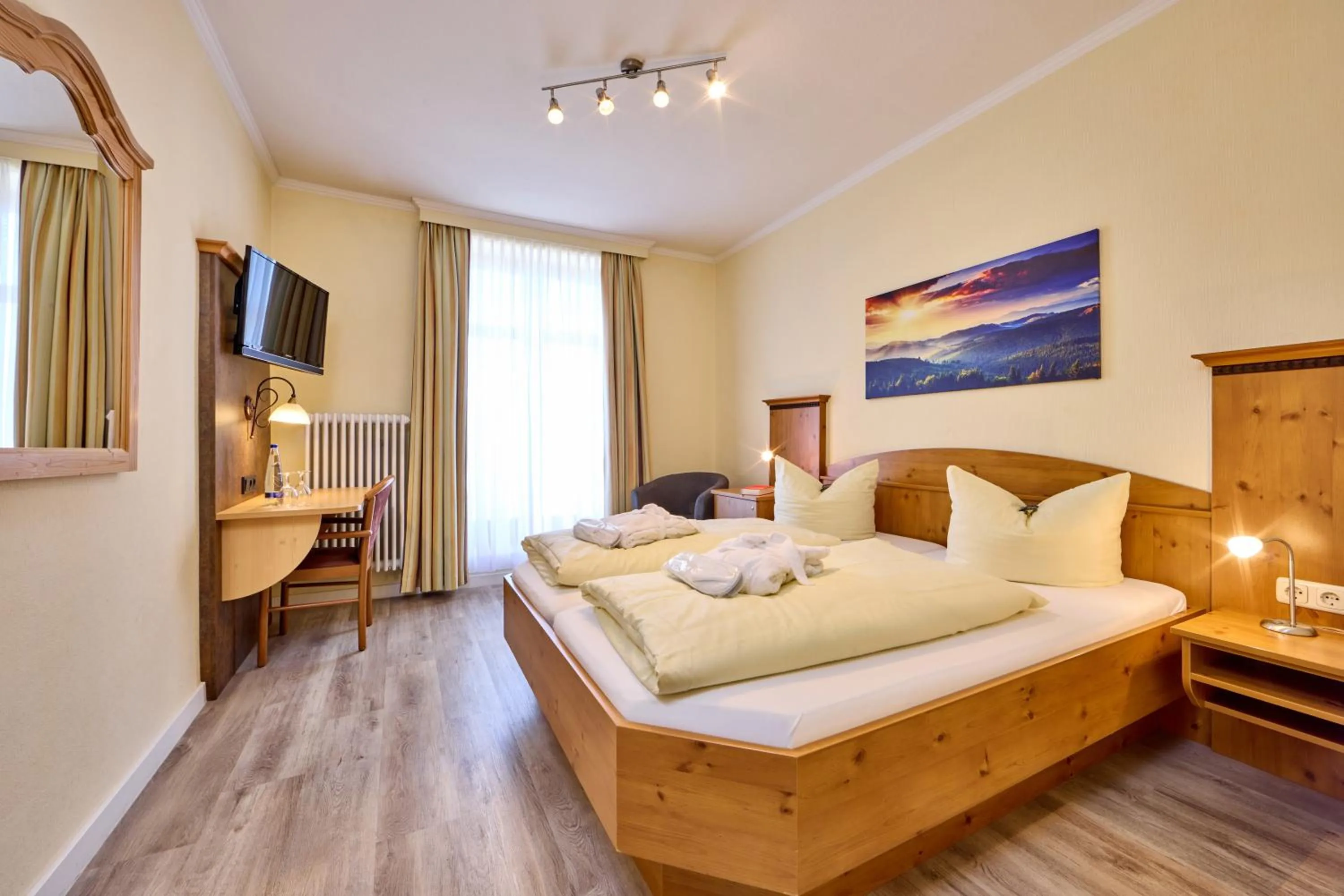 Bed in Hotel Vier Jahreszeiten