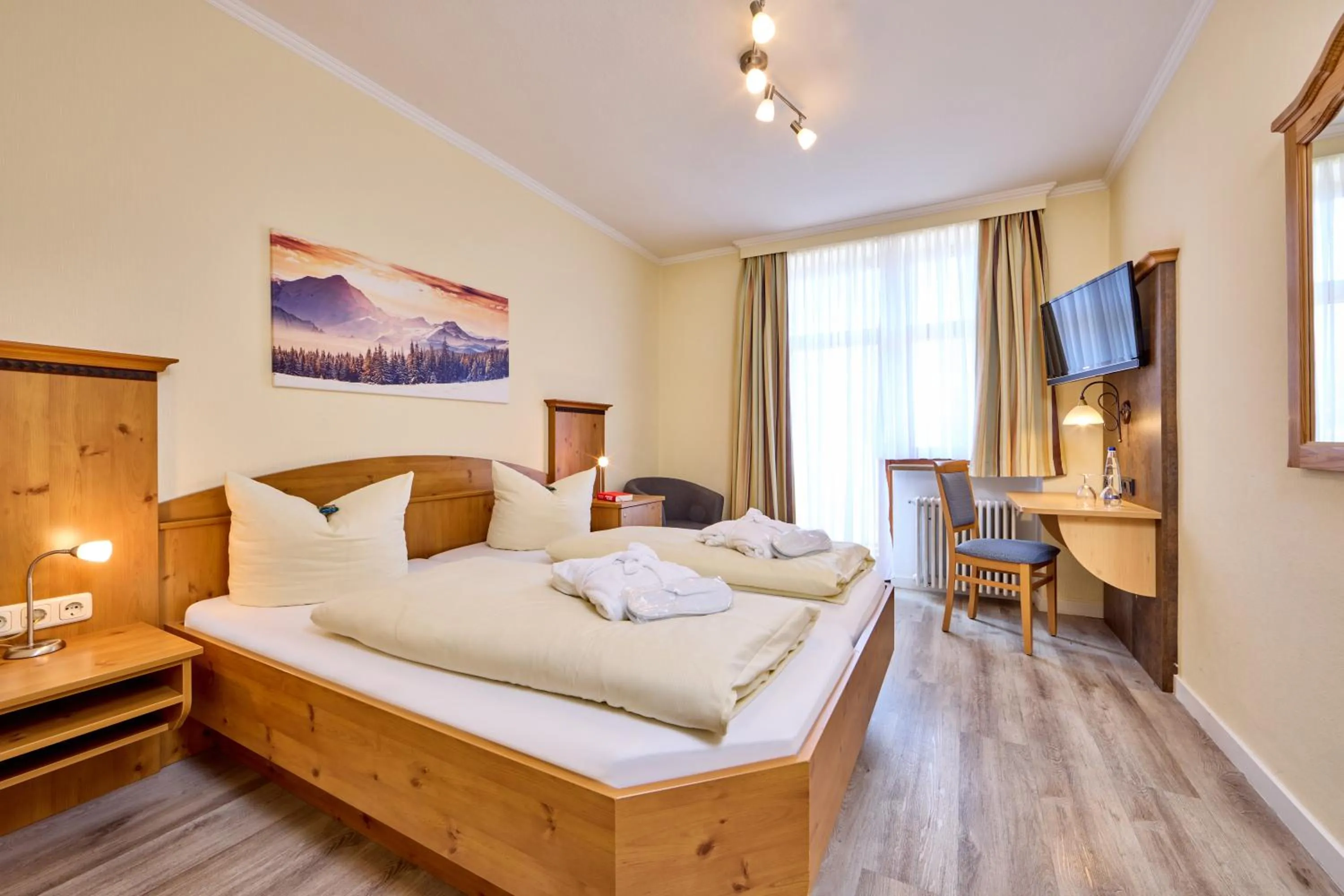 Bed in Hotel Vier Jahreszeiten