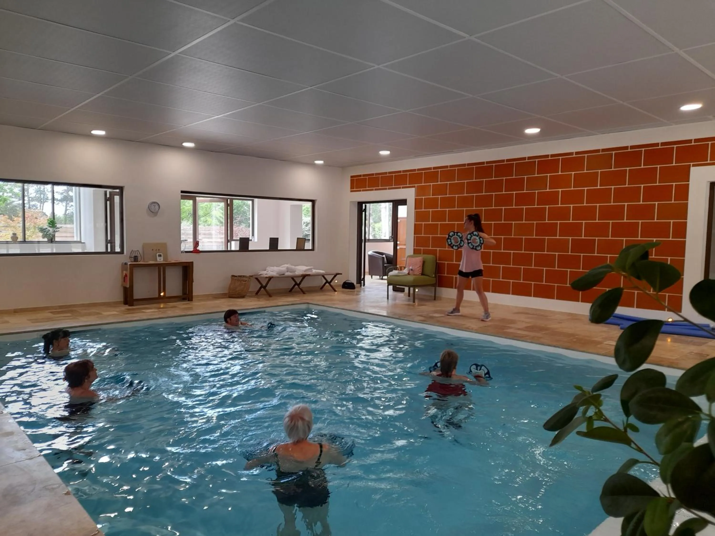 Swimming pool in Les Lodges du golf de la Marterie