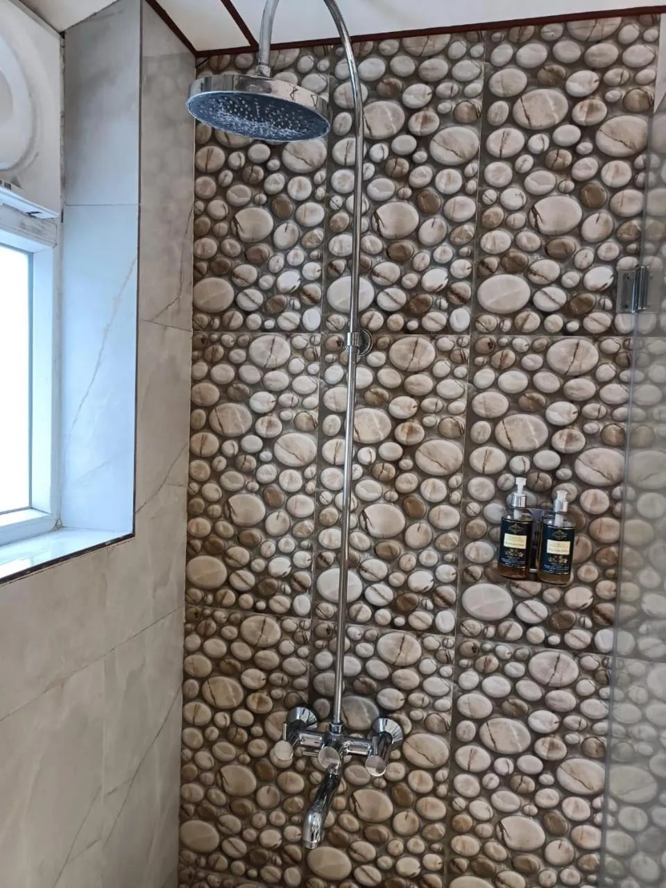 Shower in Suryavilas Luxury Resort & Spa