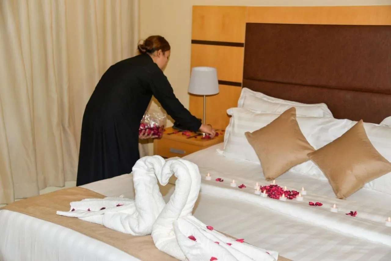 Staff, Bed in Ozone hotel