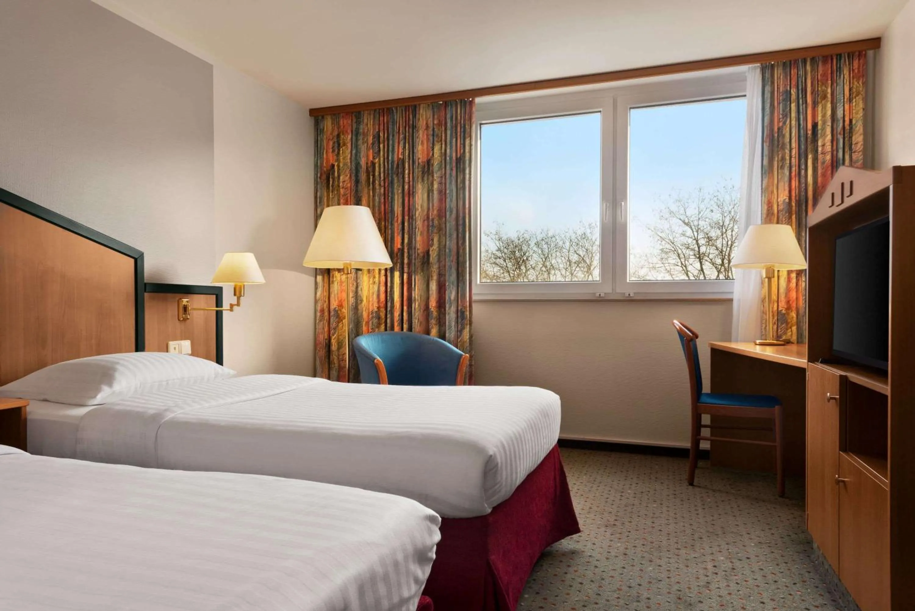 Photo of the whole room, Bed in Ramada by Wyndham Bottrop City