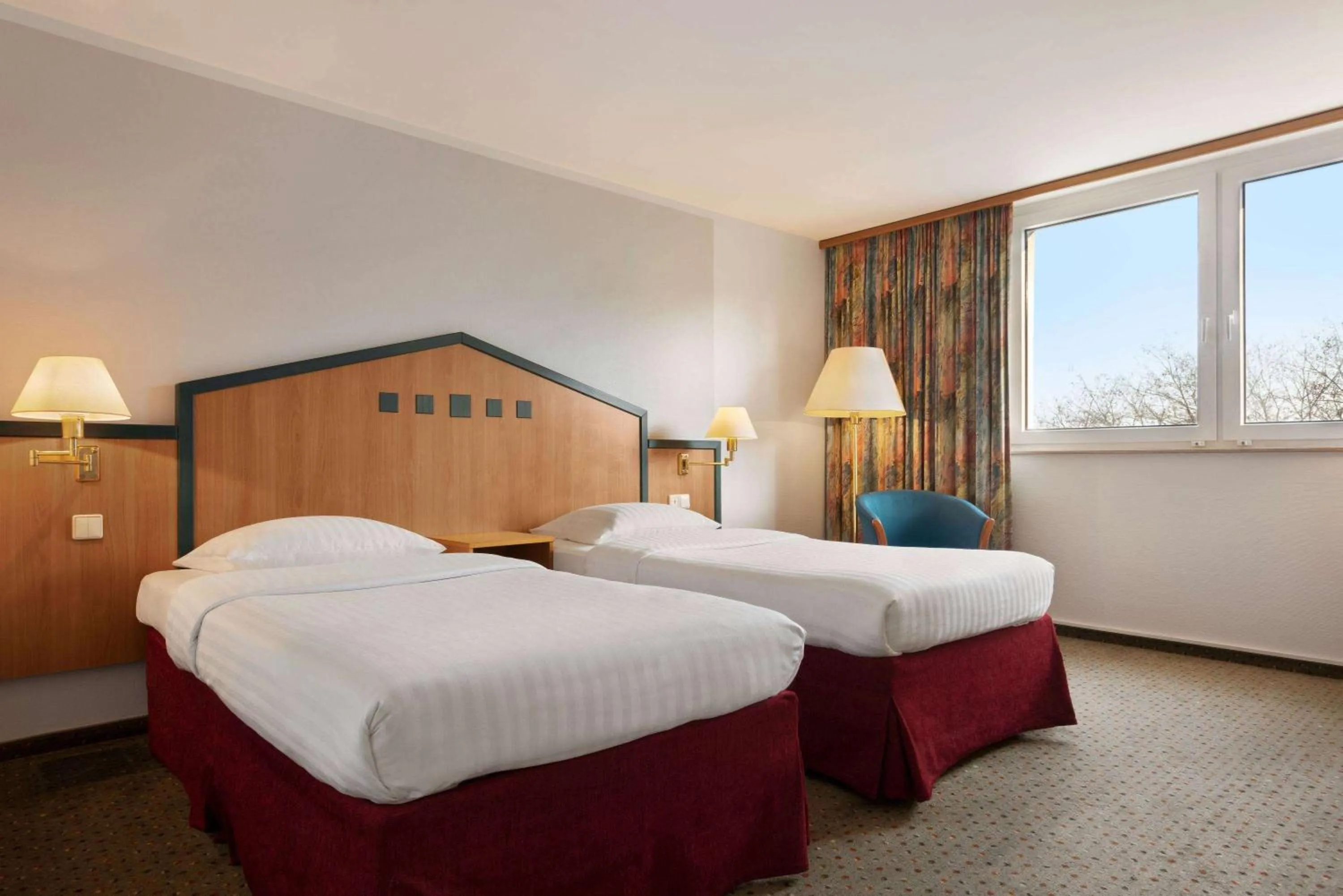 Photo of the whole room, Bed in Ramada by Wyndham Bottrop City