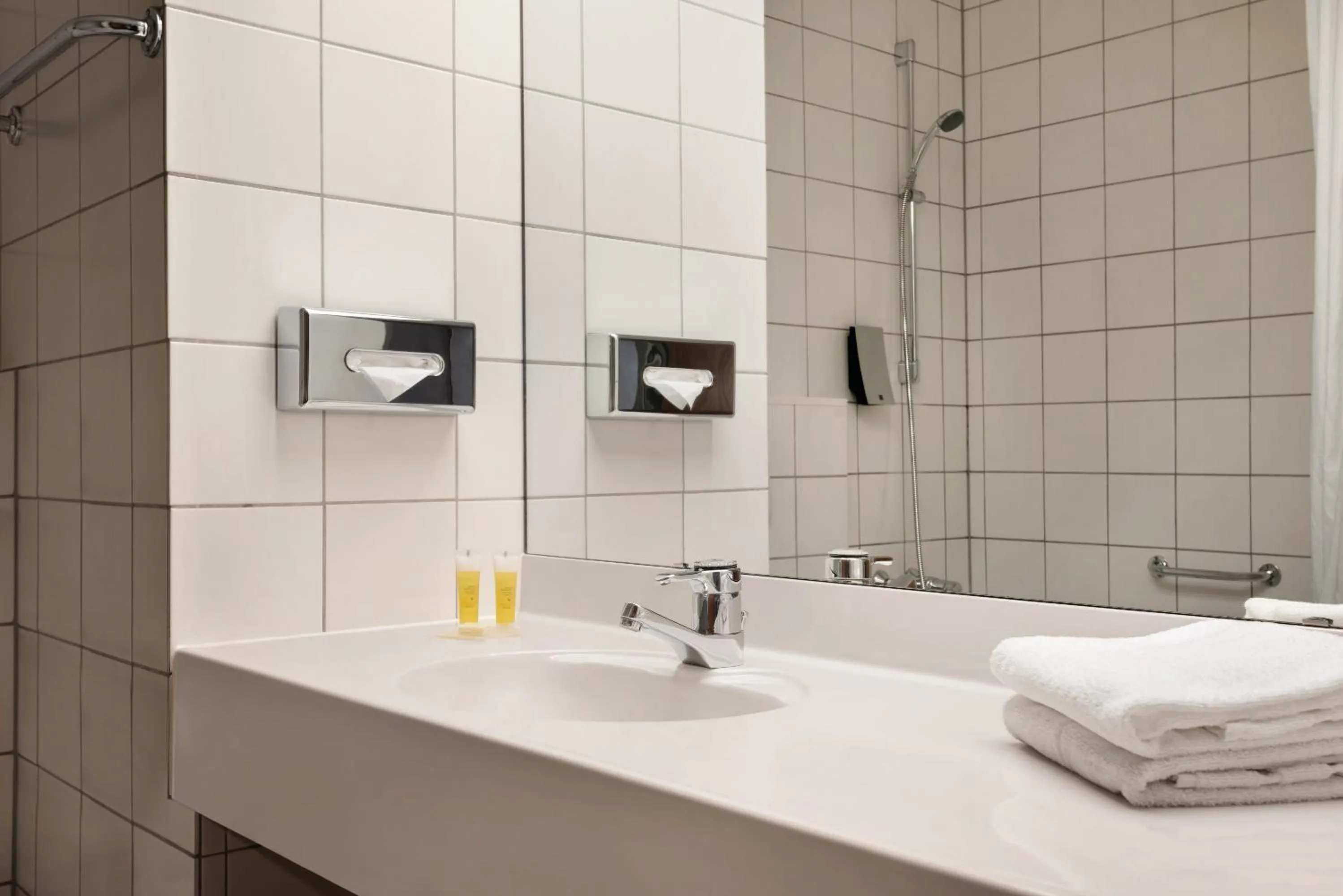 Bathroom in Ramada by Wyndham Bottrop City