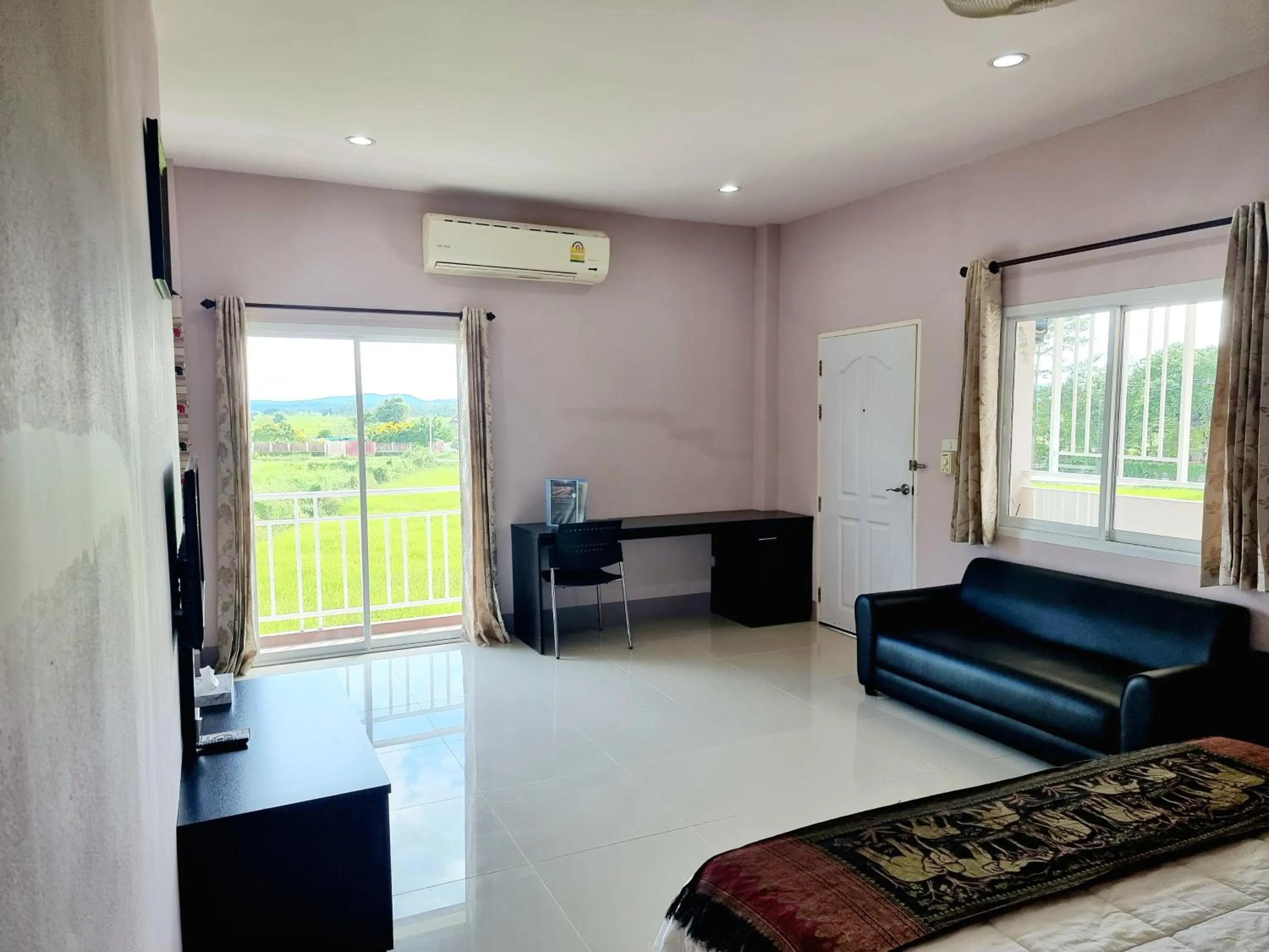 Bedroom in Chiangkham Grand Villa - SHA Certified