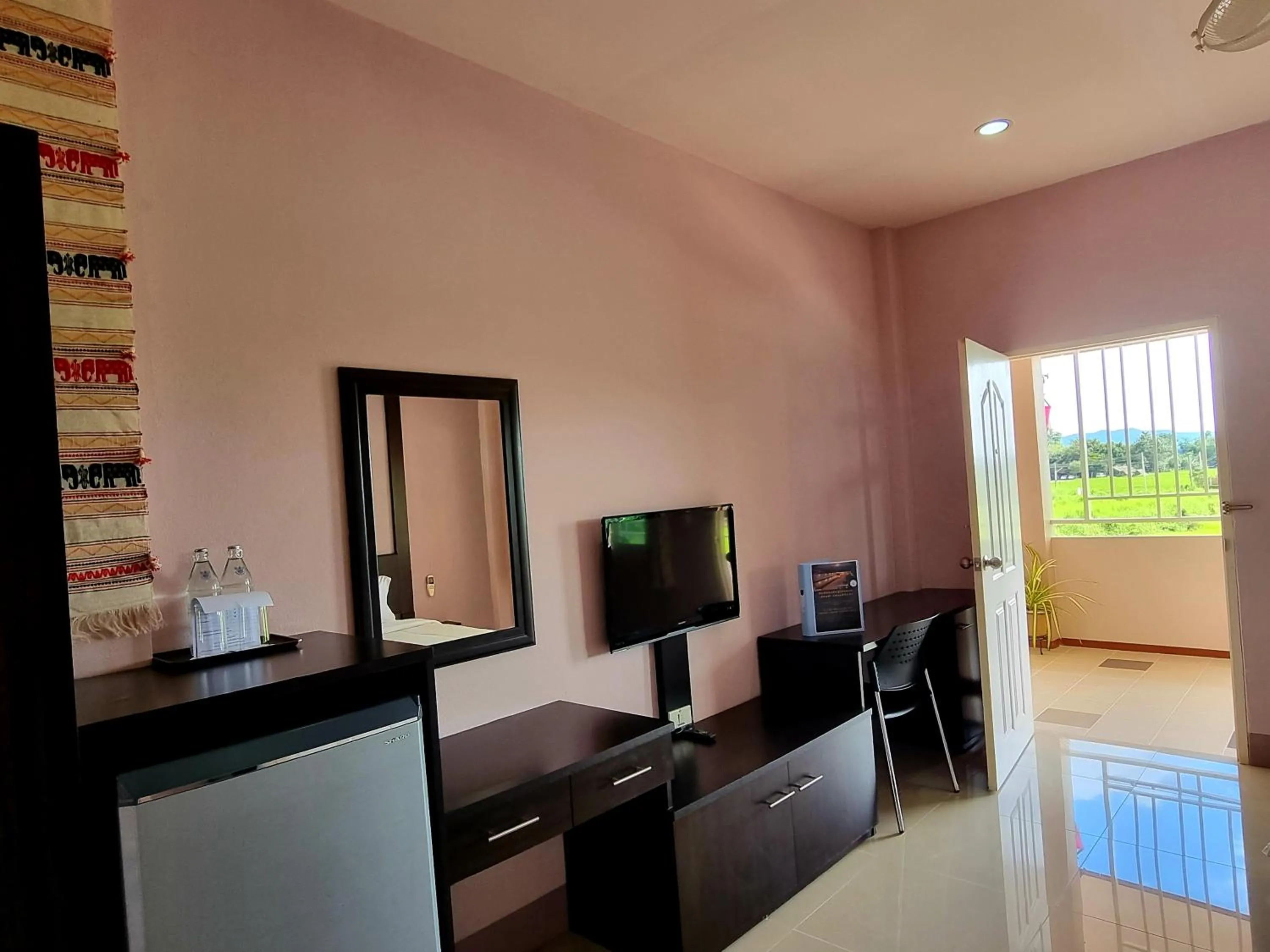 Bedroom in Chiangkham Grand Villa - SHA Certified