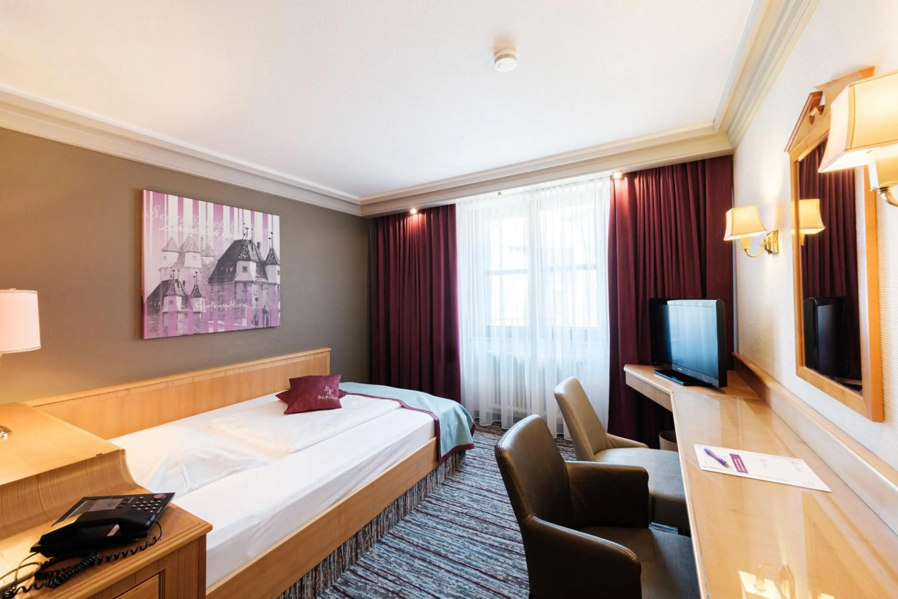 Bed in Hotel Pelikan