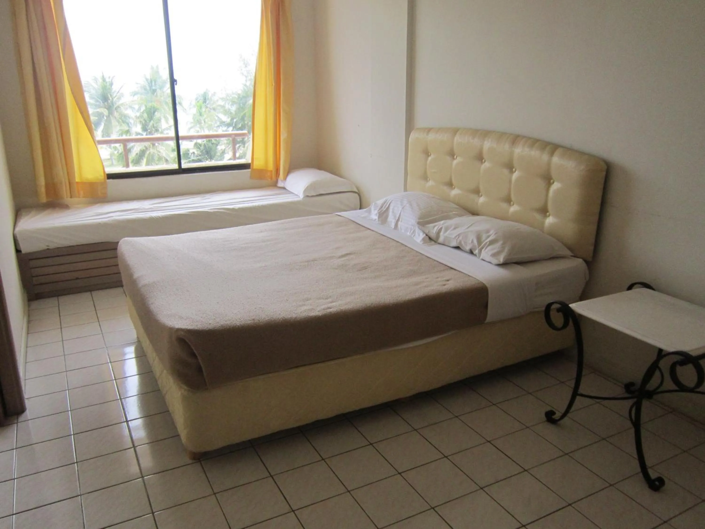 Bed in Paradise Lagoon Apartment