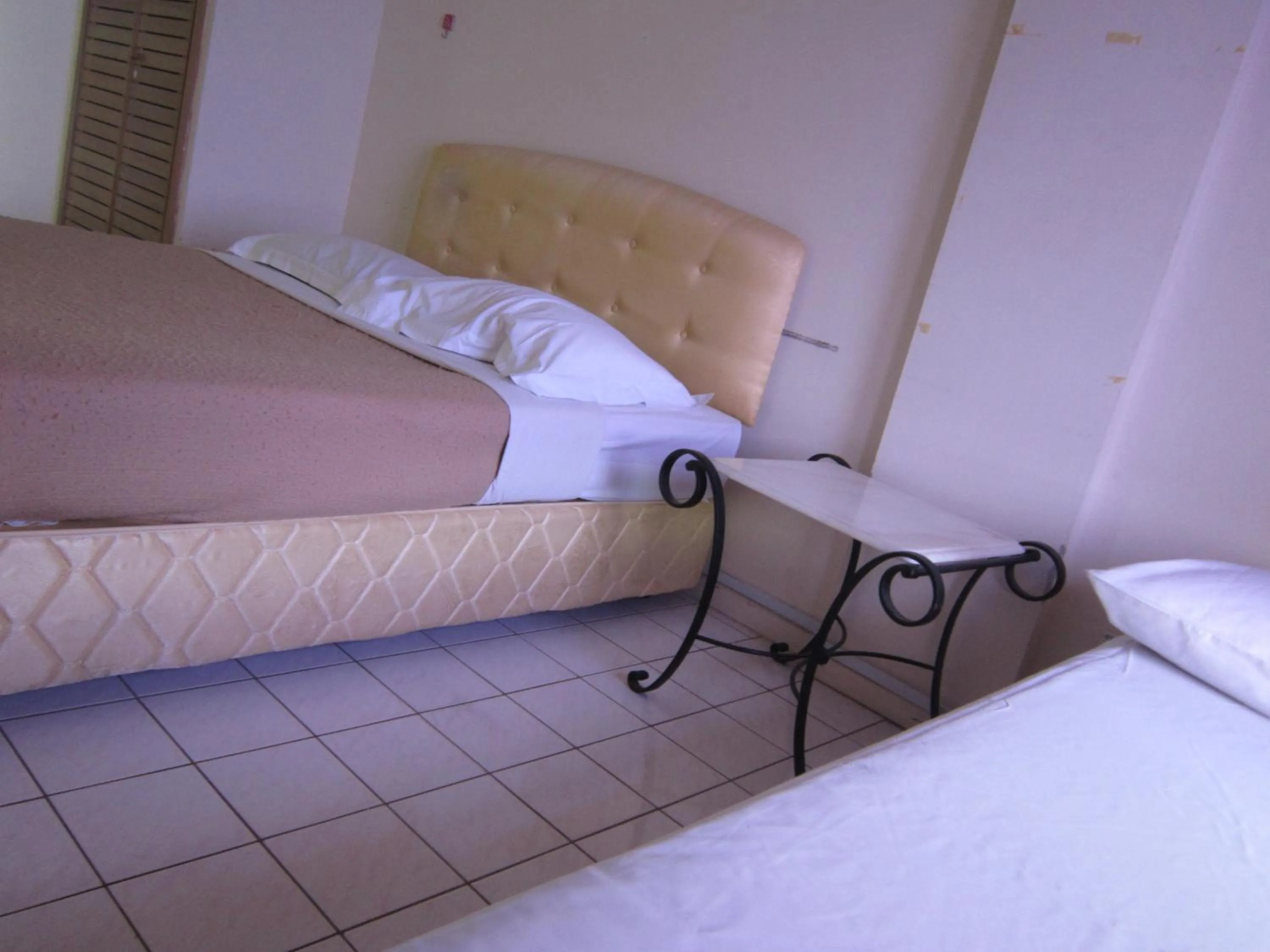 Bed in Paradise Lagoon Apartment