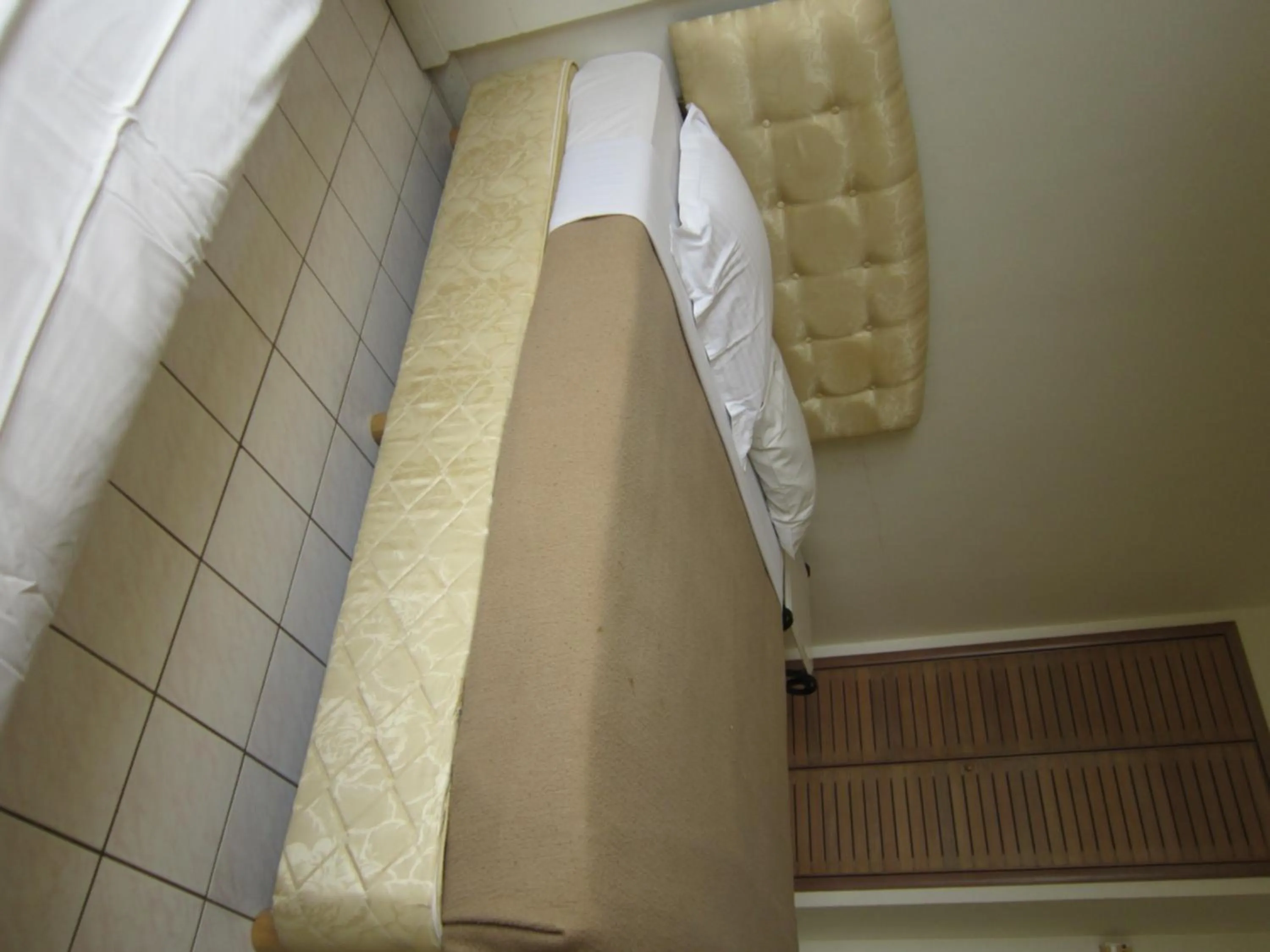 Bed in Paradise Lagoon Apartment