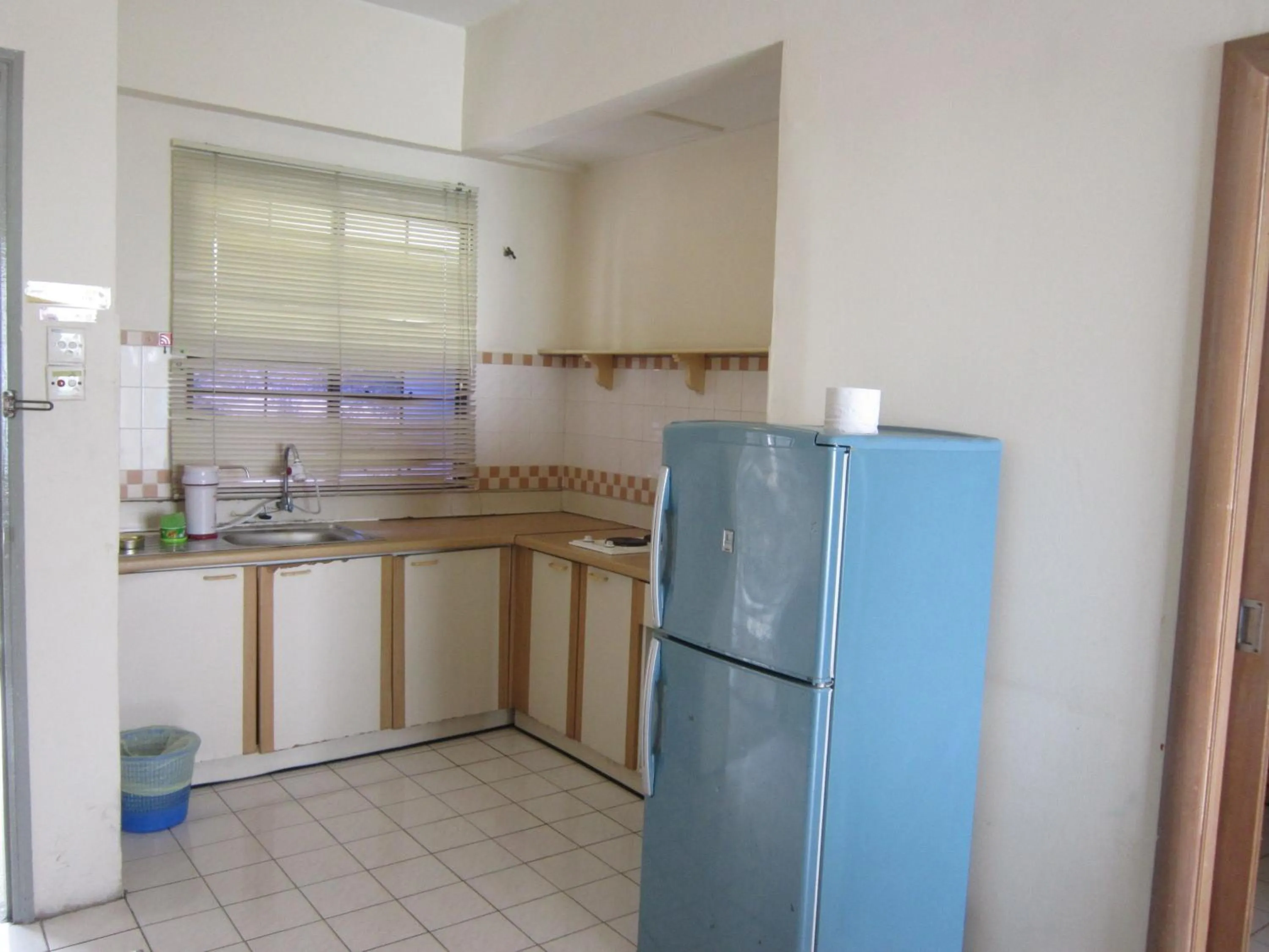 Kitchen or kitchenette in Paradise Lagoon Apartment