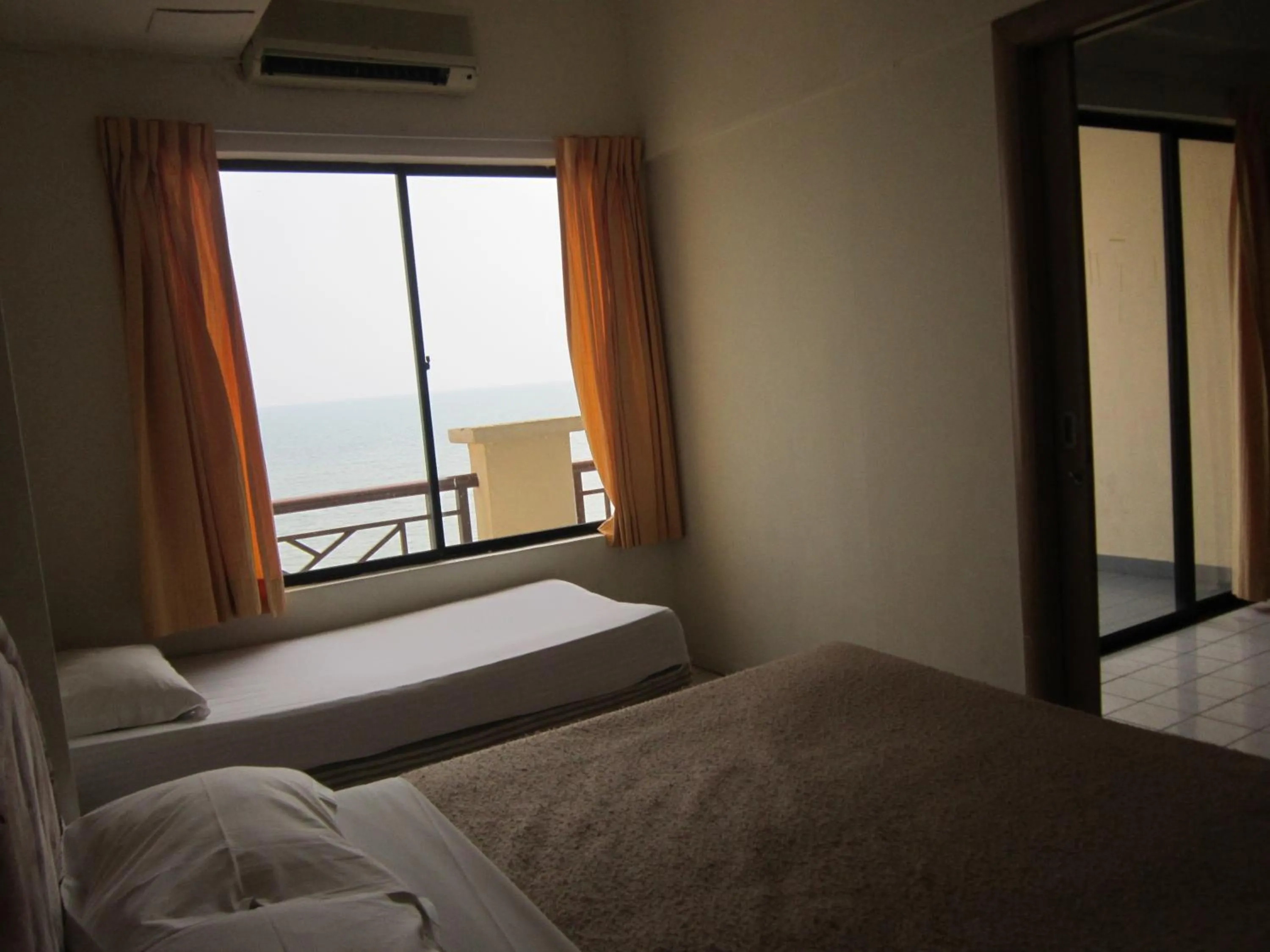 Bed in Paradise Lagoon Apartment