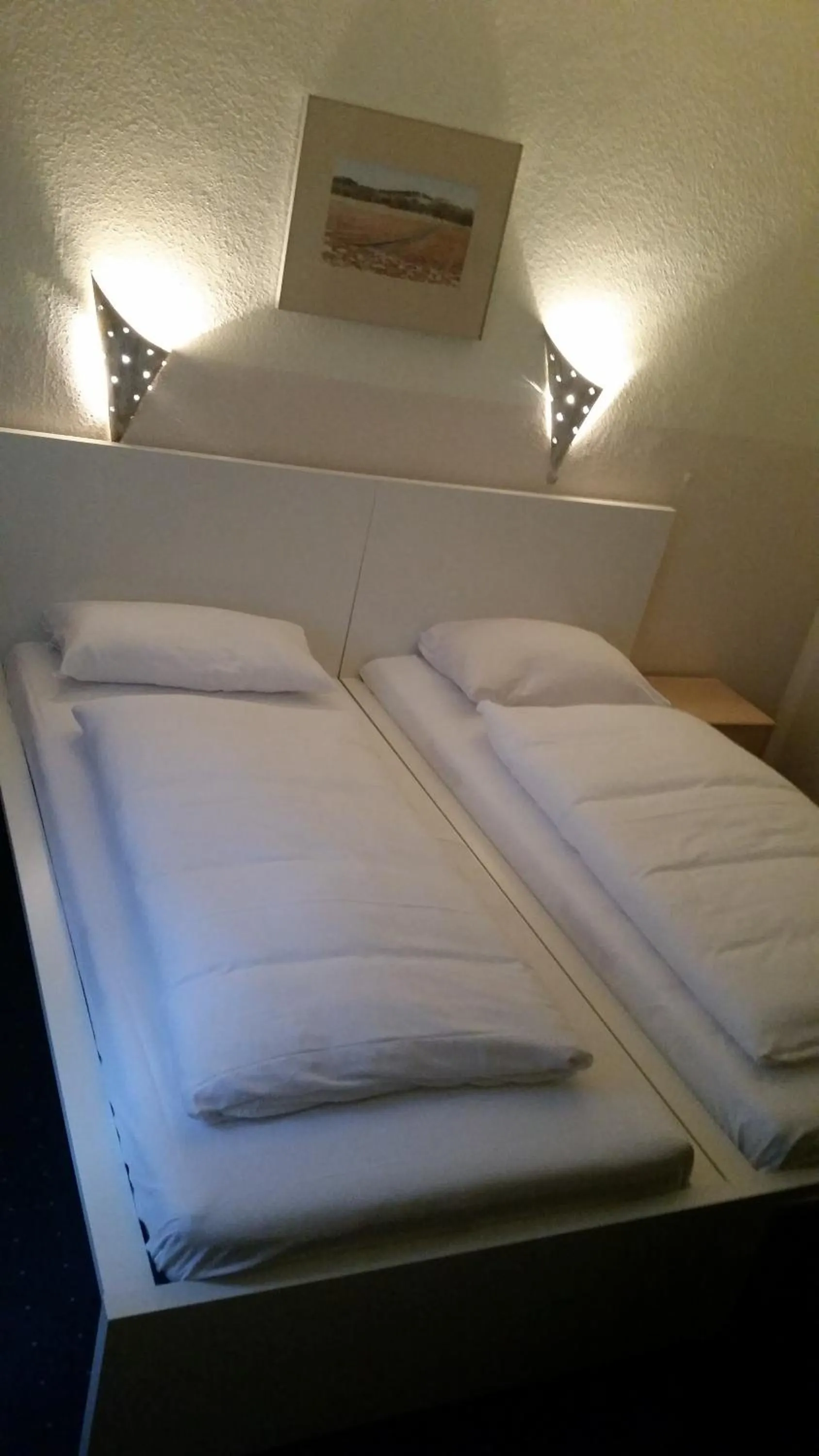 Bed in Hotelgarni Frankfurt