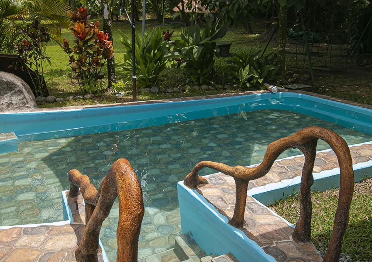 Pool view in Cabañas Río Escondido en La Fortuna
