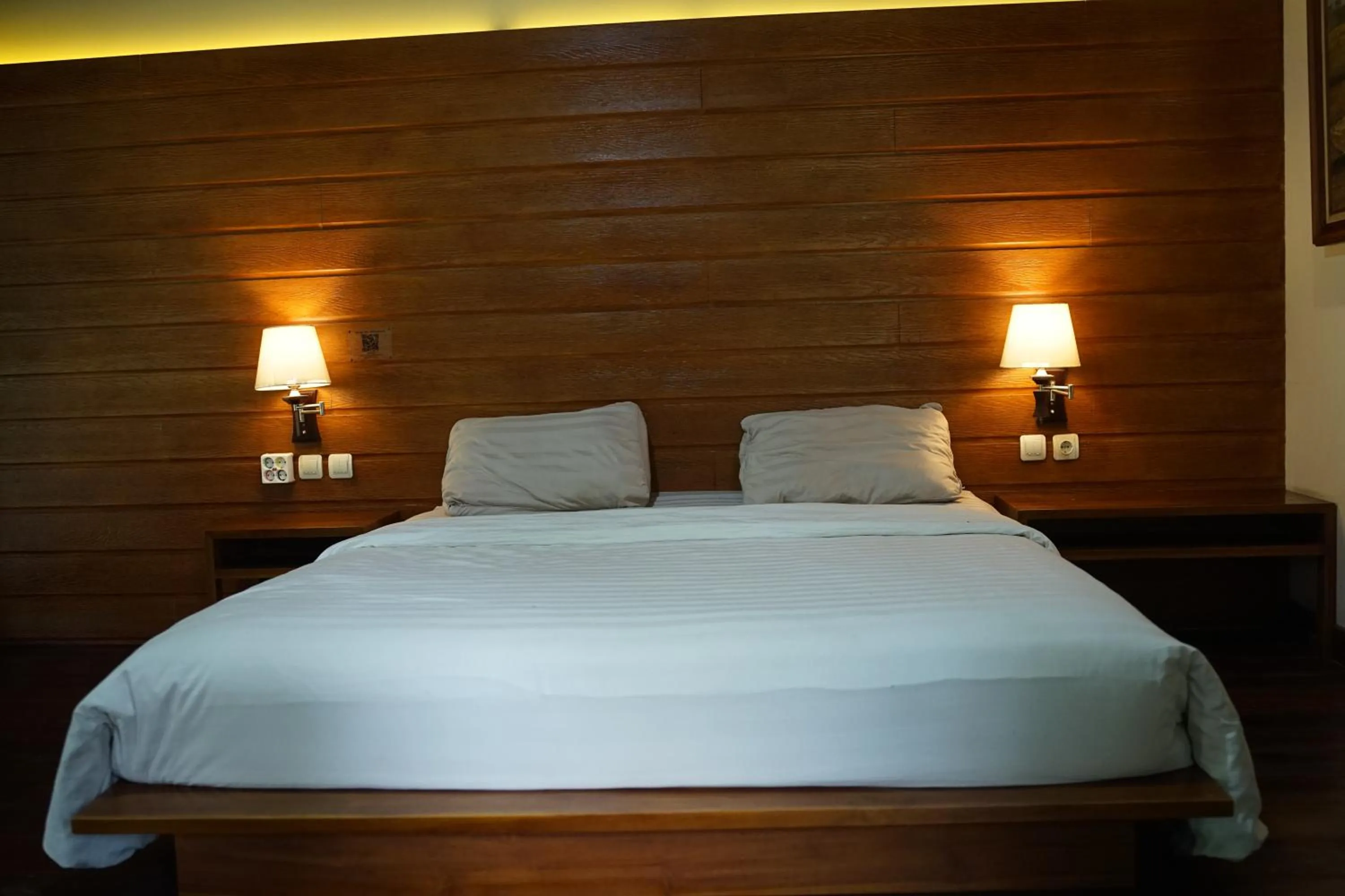 Bed in Tirta Arsanta Hot Springs & Villa