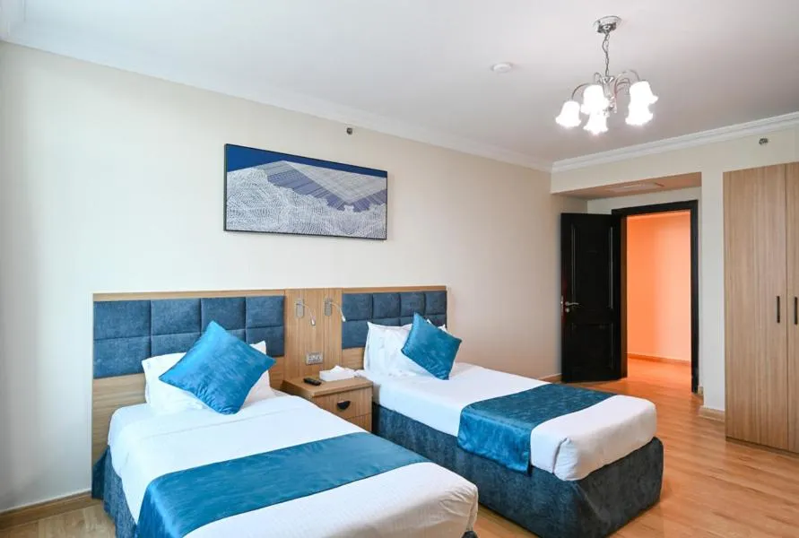 Bed in Saray Musheireb Hotel Suites and Apartment