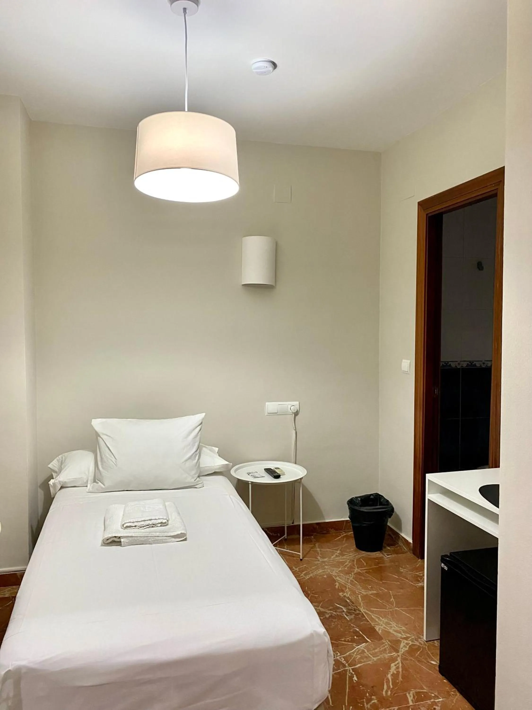 Bed in La Vega Rooms