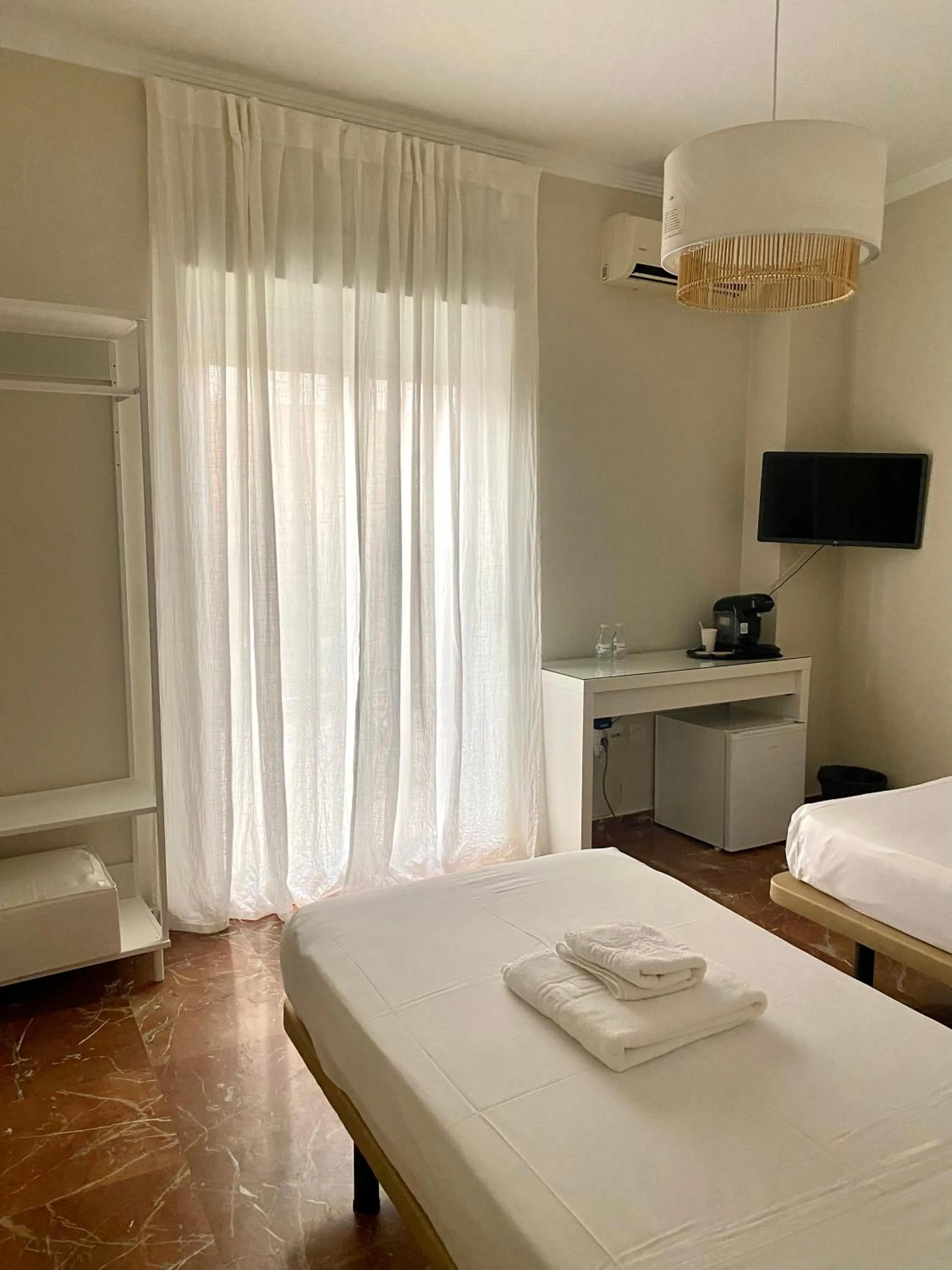 Bed in La Vega Rooms