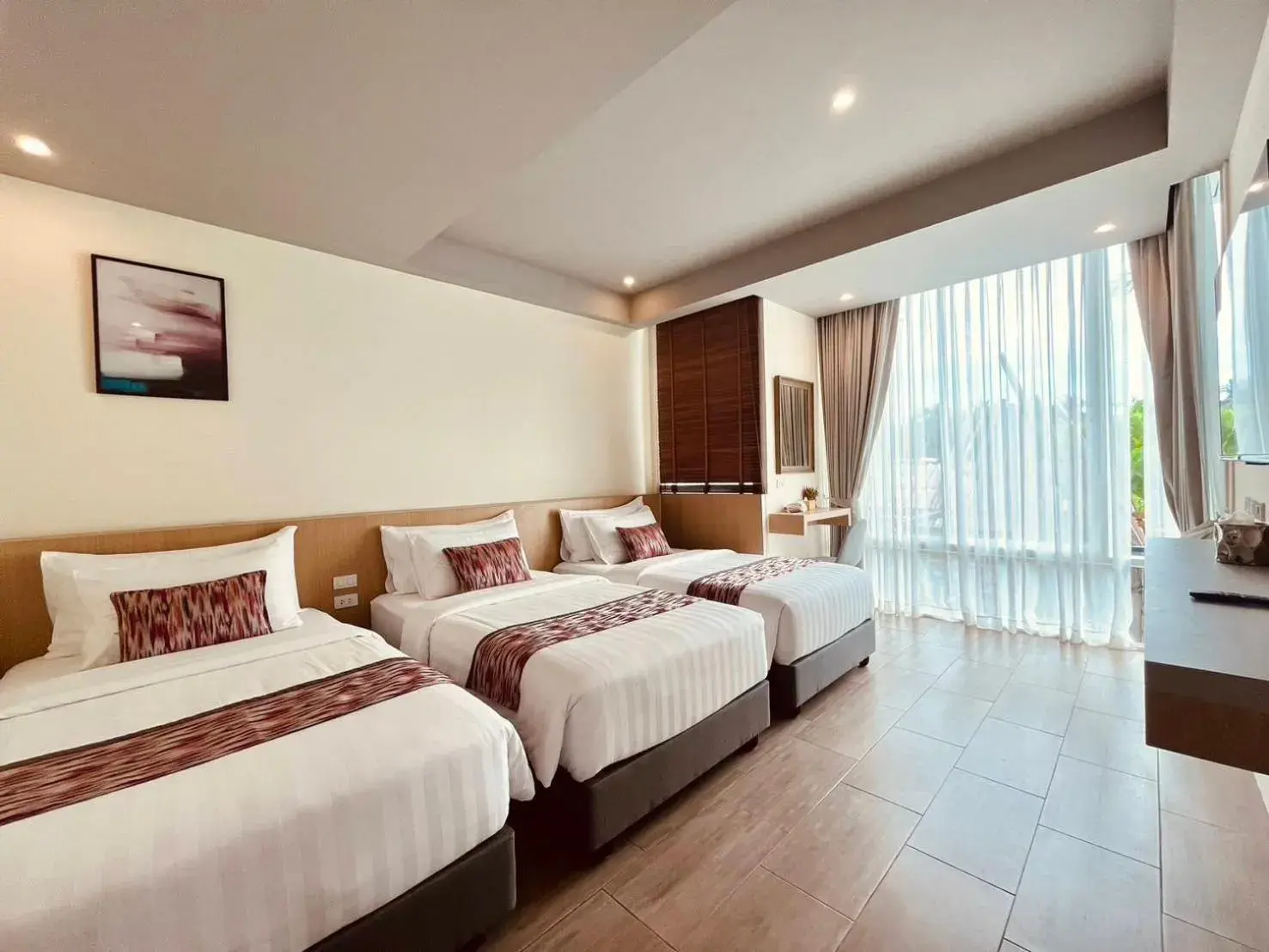 Triple Room with Sea View in Charcoal Panwa Beach Phuket Triple Room with Sea View in Charcoal Panwa Beach Phuket