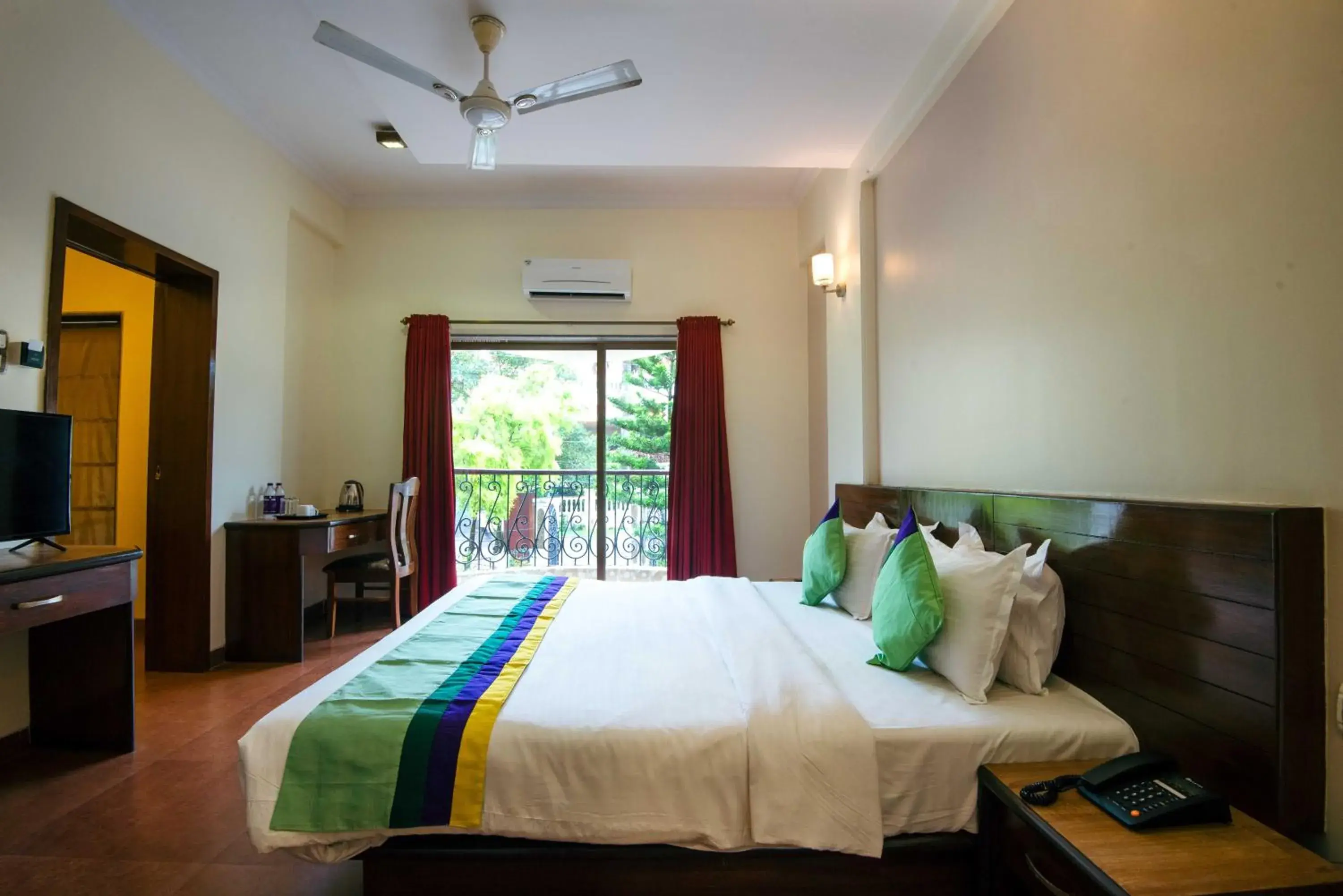 Spacious Premium Room with Balcony in Treebo Reveniir Resort with Pool Spacious Premium Room with Balcony in Treebo Reveniir Resort with Pool